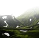 green mountain under white sky during daytime