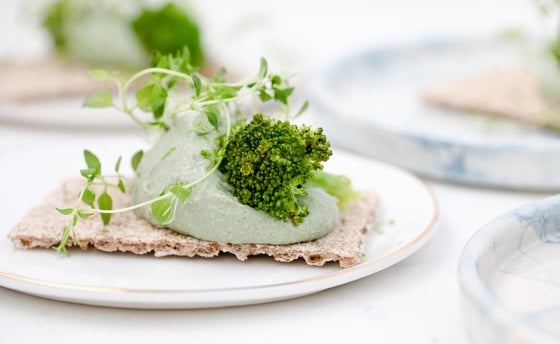 green vegetable on white ceramic plate