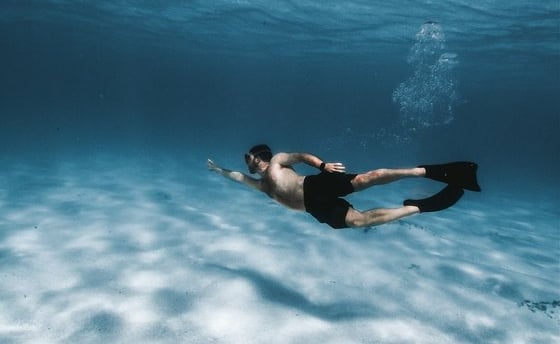 woman in black bikini in water