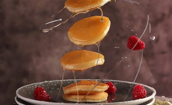 sliced fruit on white ceramic plate