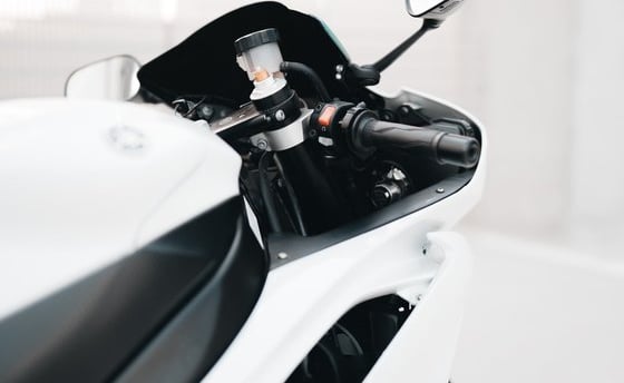 white and black sports bike