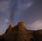 brown concrete building under starry night