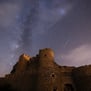 brown concrete building under starry night
