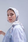 woman in white hijab smiling