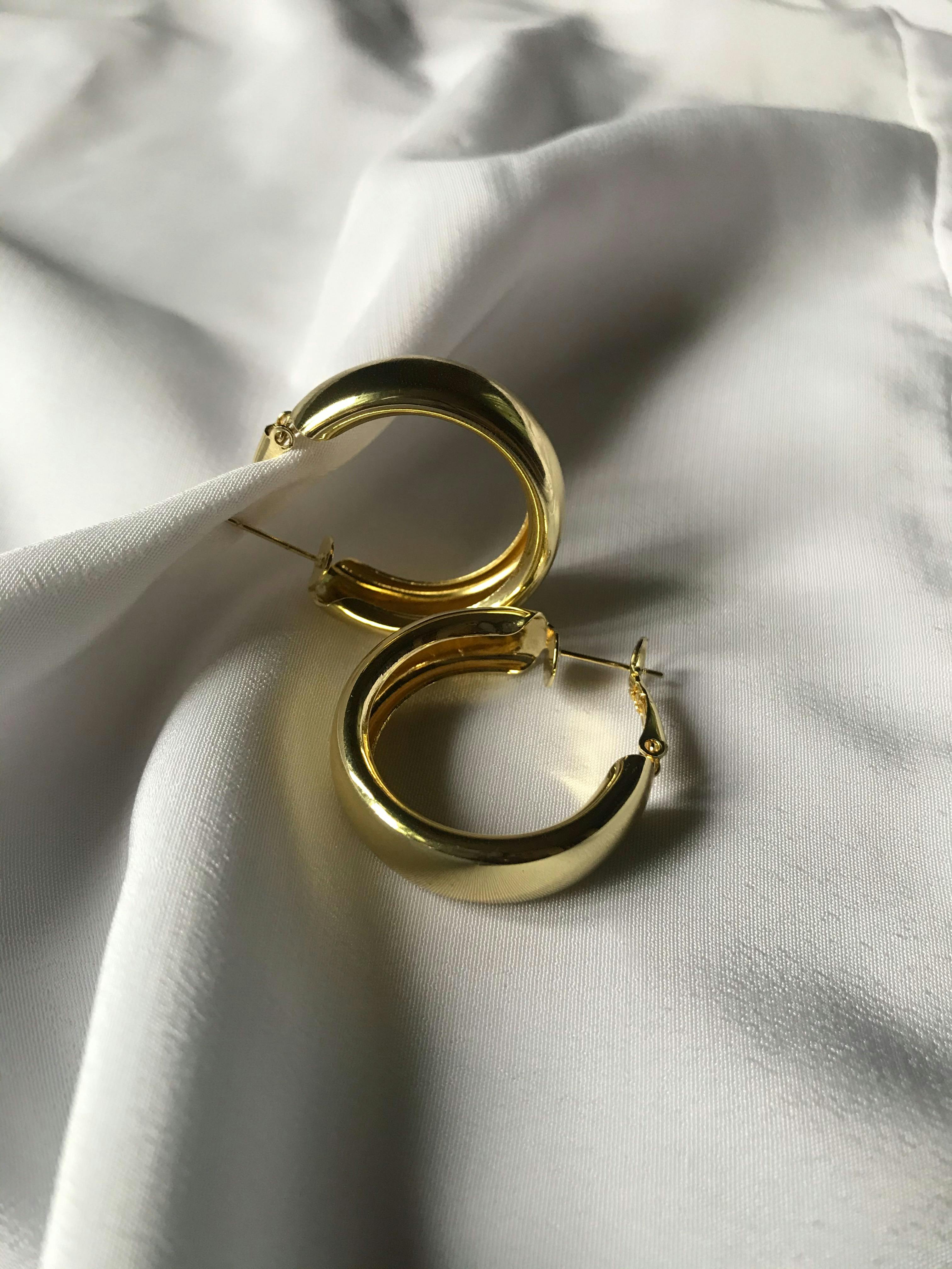 Golden drop hoop earrings