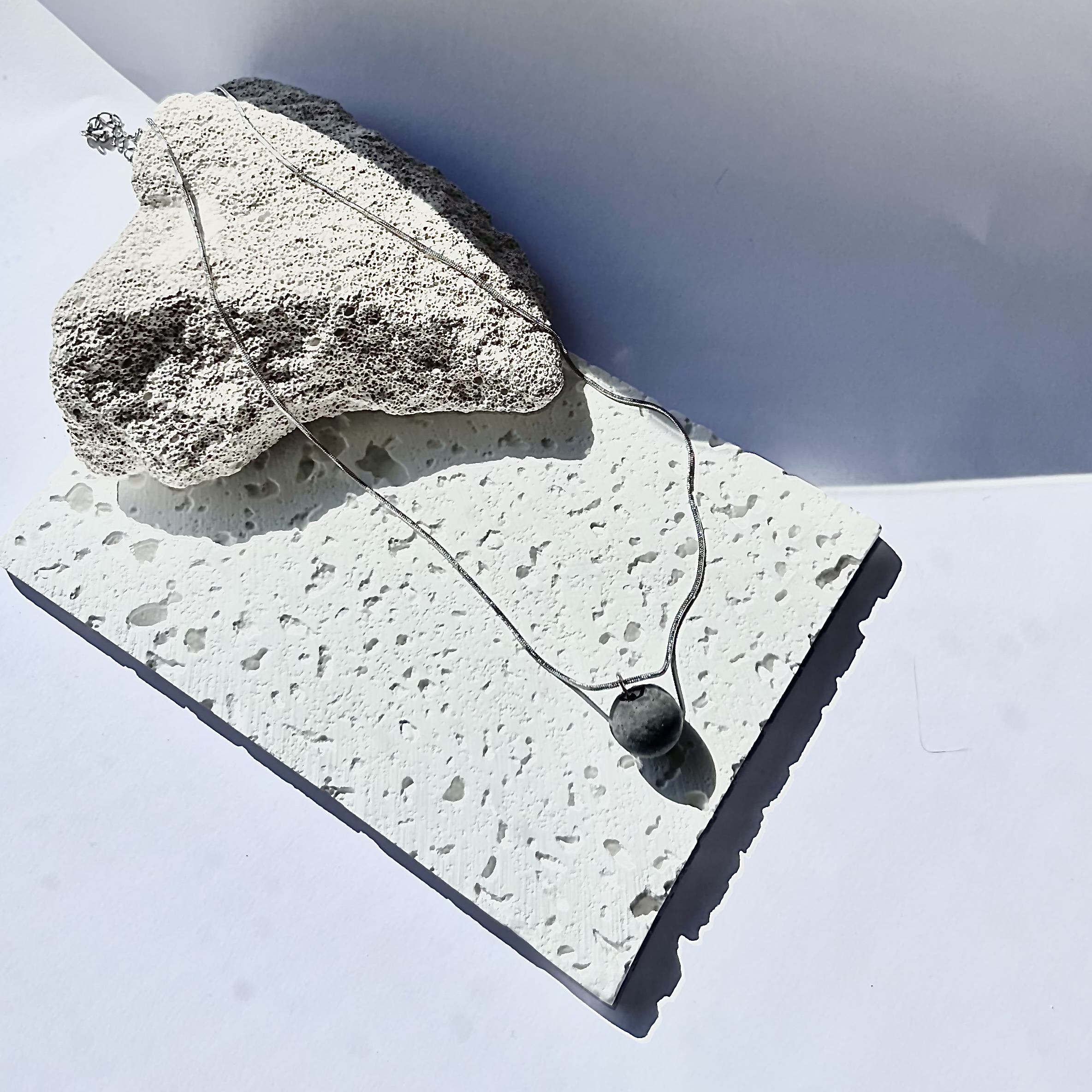 Pakabukas MAŽA PLANETA ner. pl. / Pendant SMALL PLANET stainl. st. 