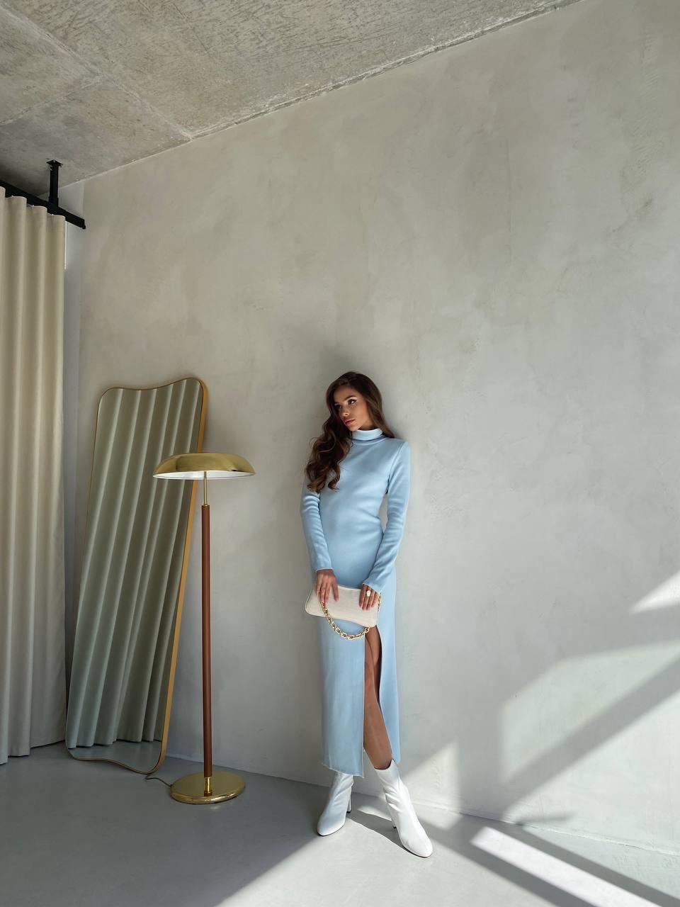 Ilga megzta suknelė