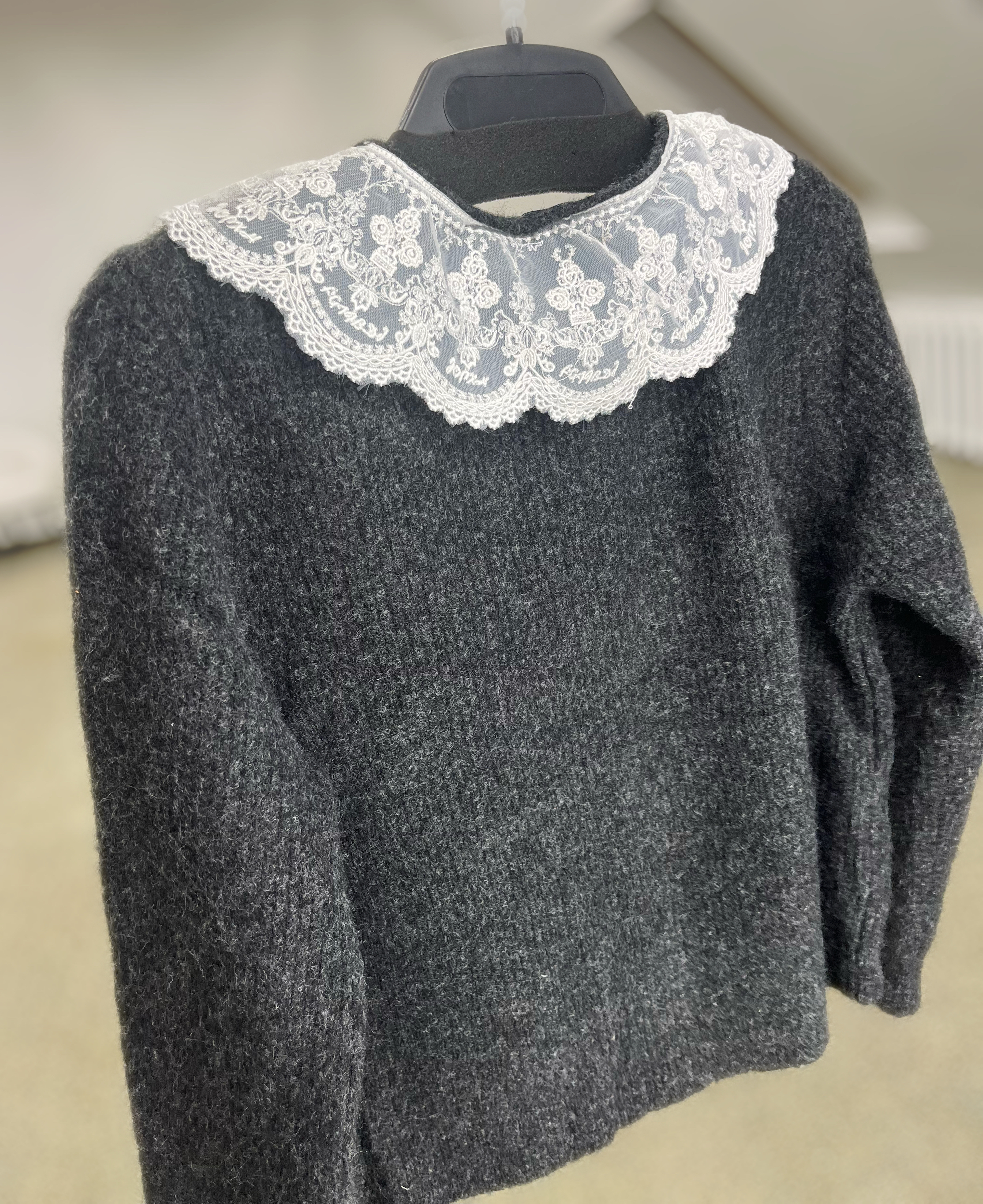 Megztinis su apykakle