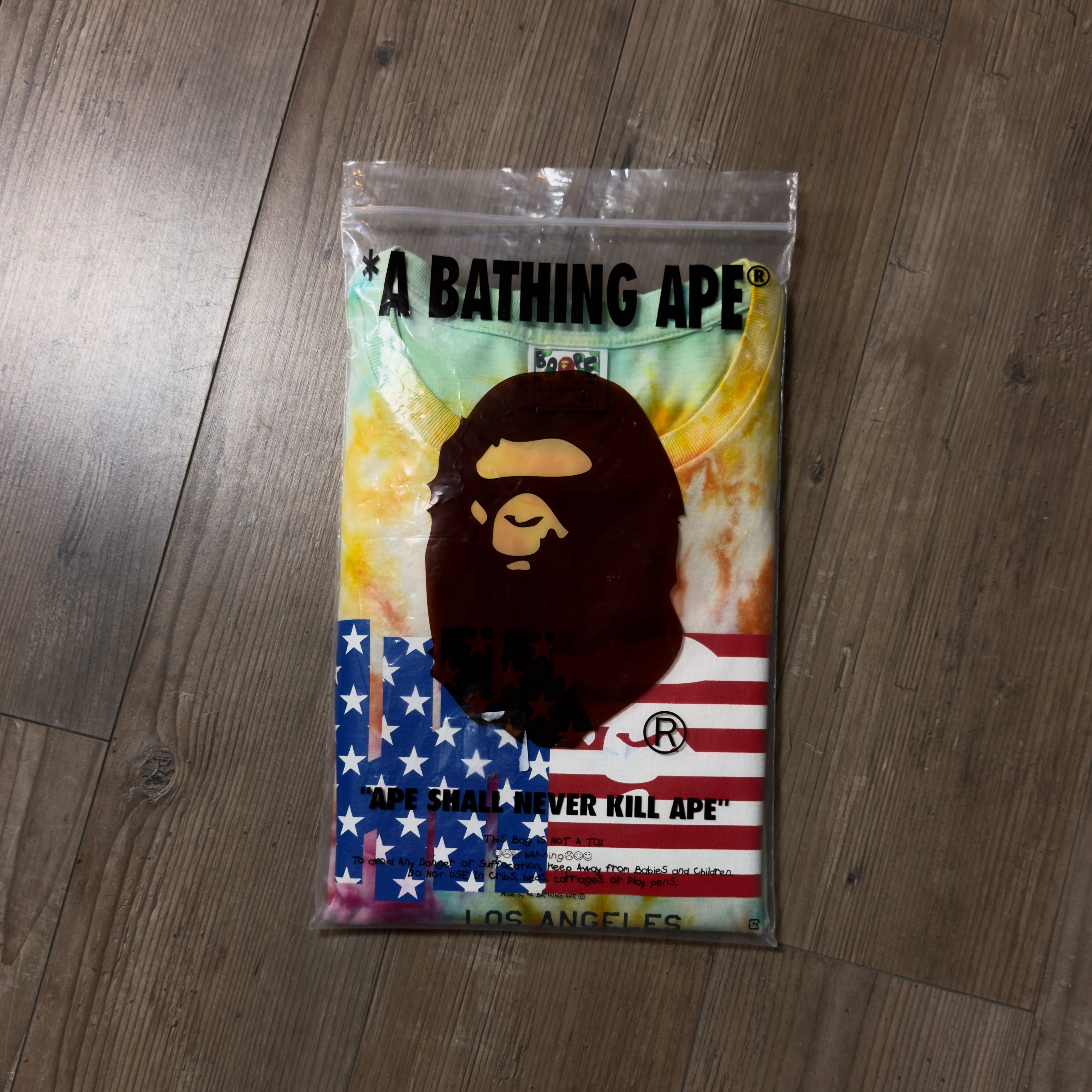 (XL) Bape x Undefeated Mr Cartoon Flag Tie Dye Tee 2015