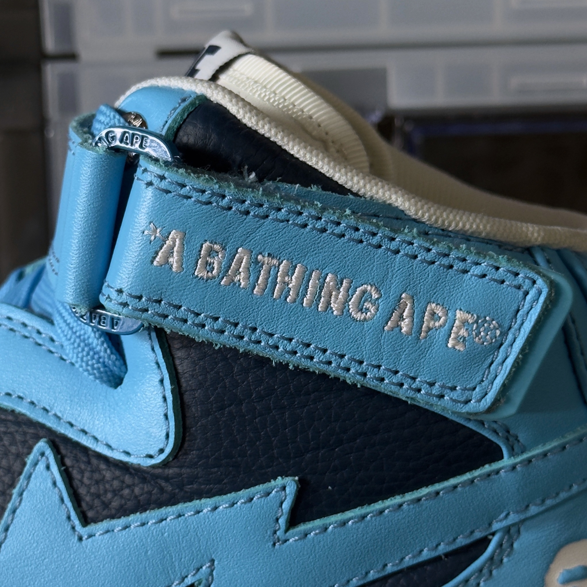 (41) A Bathing Ape Bapesta Mid Sax 2022