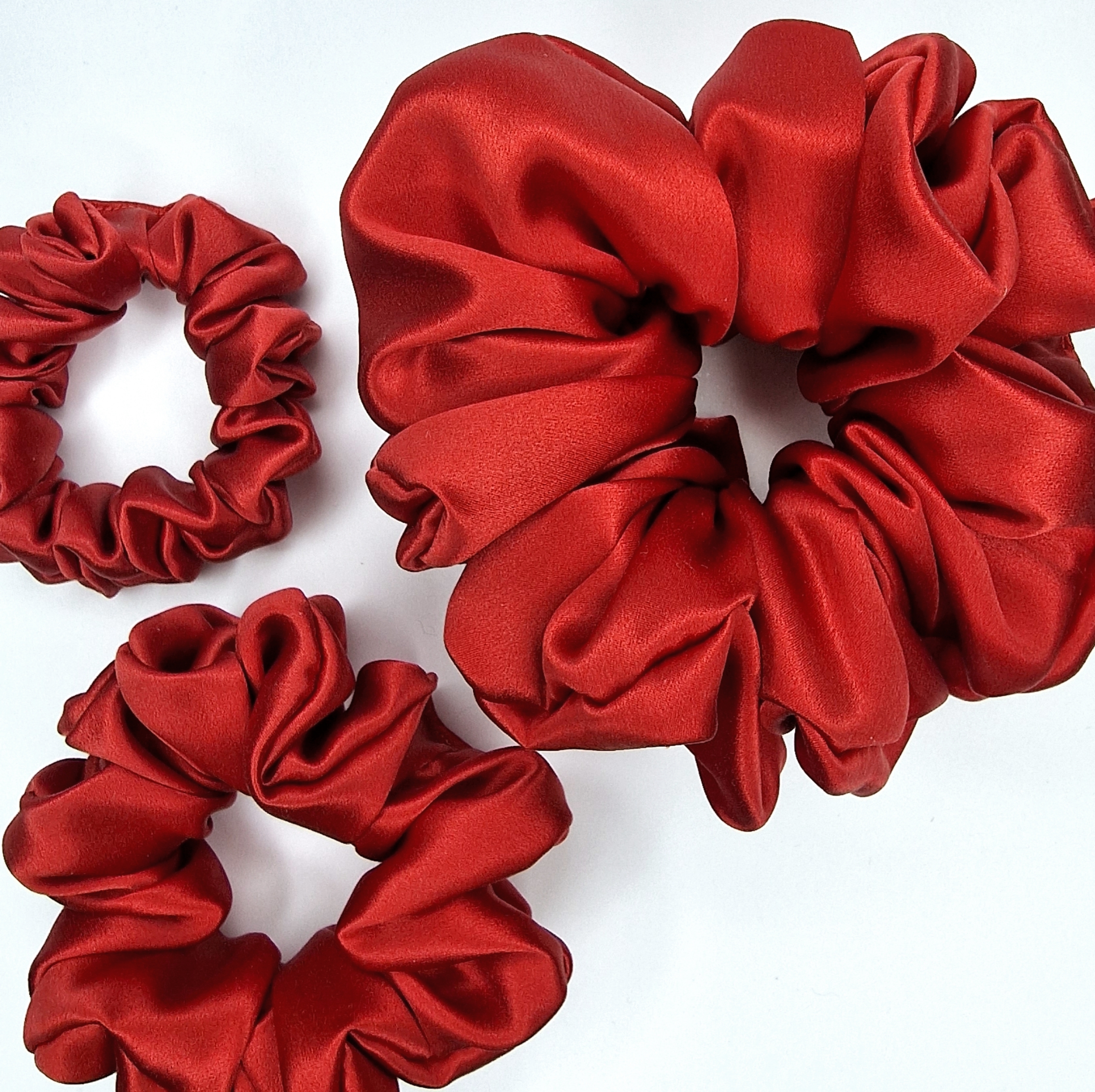 Raudona Šilkinė Gumytė