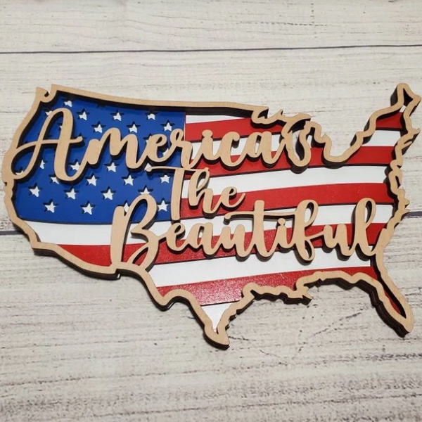 Multi-layer America the Beautiful on U.S. outline with flag inset