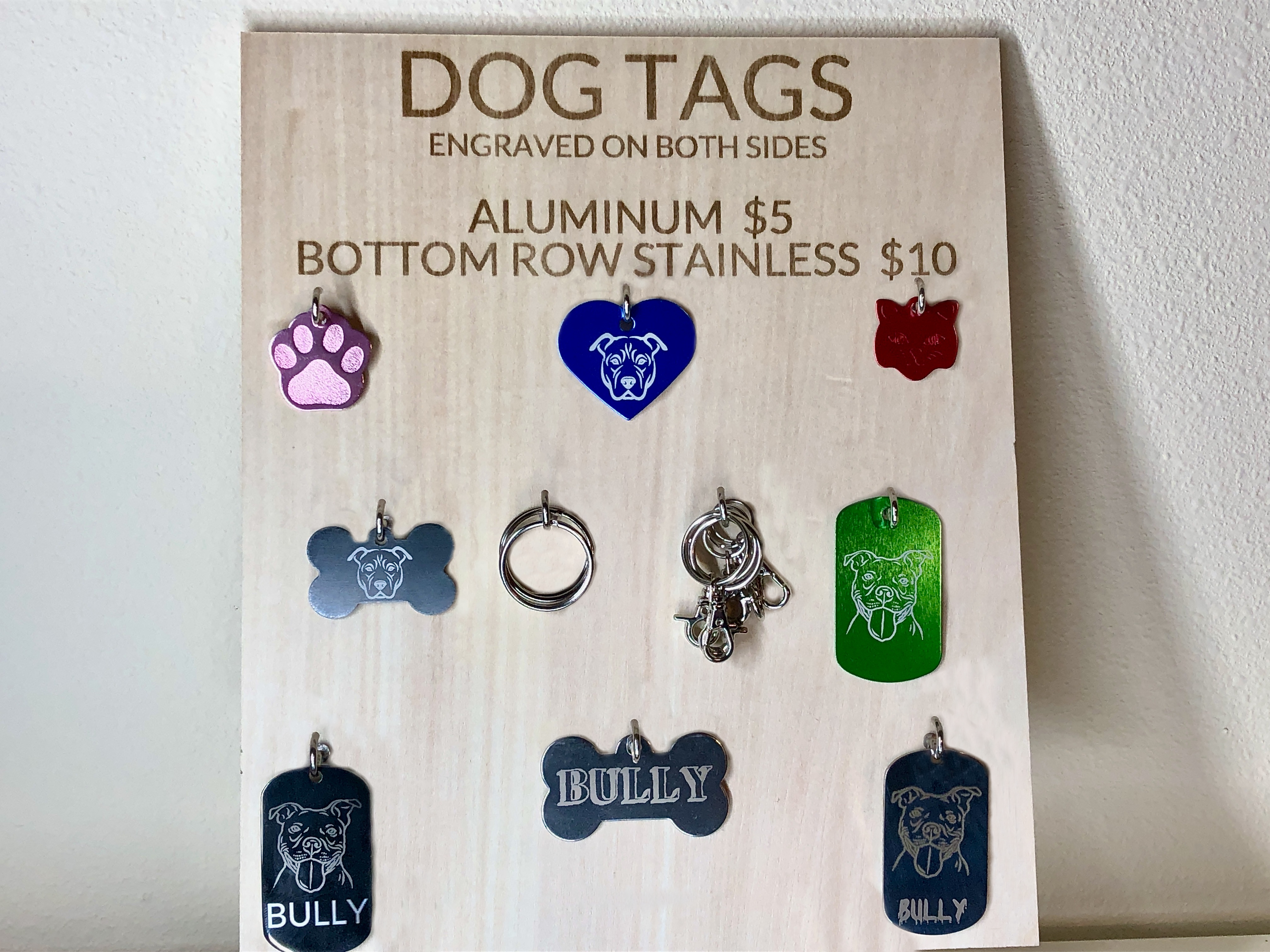 Assorted dog tags (for animals and people.)