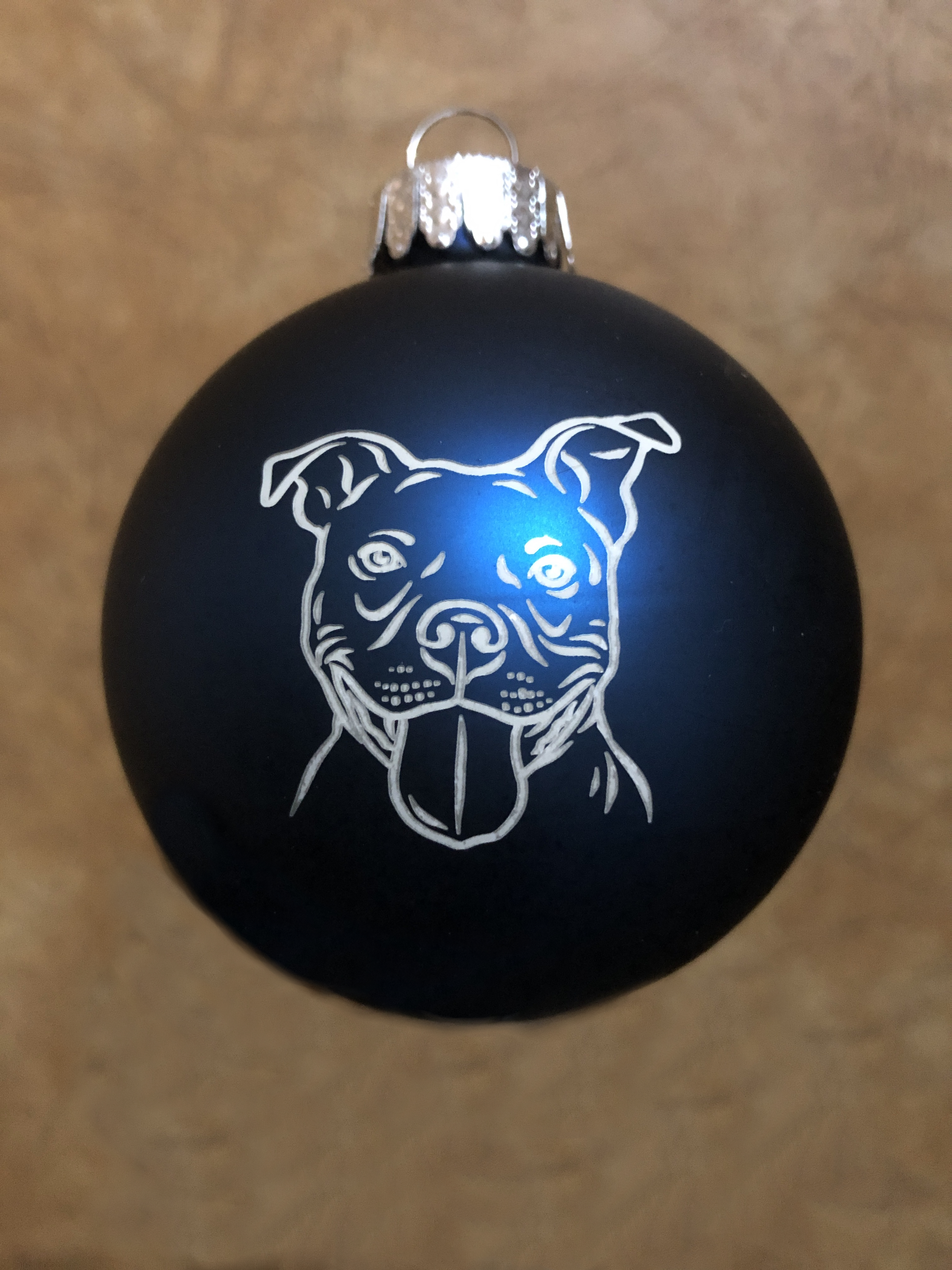 Glass ornaments in green, red, and blue - shiny or matte finish. 