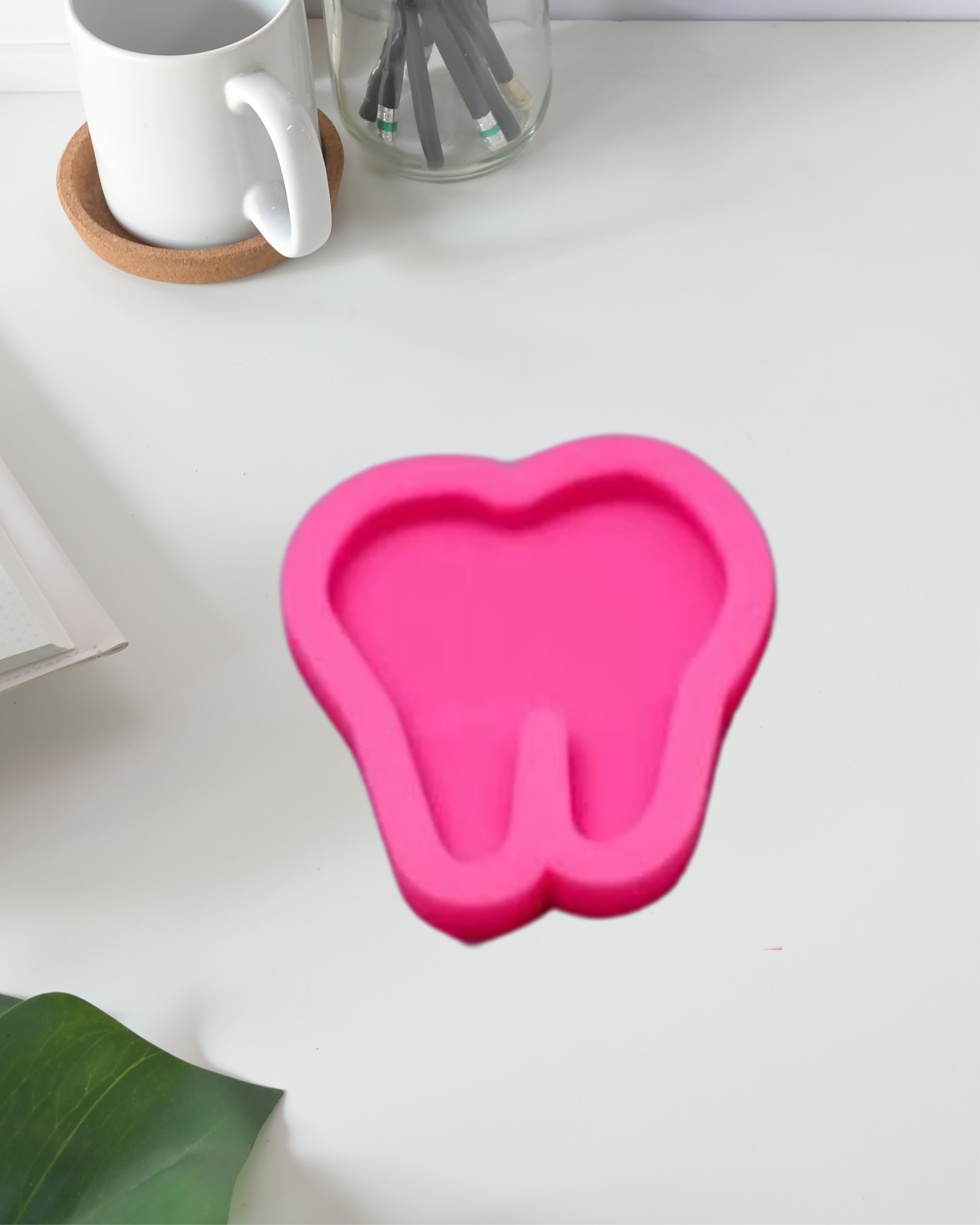 Molde de silicona en forma de diente