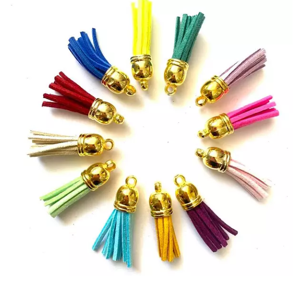 Paquete 12 borlas base dorada colores surtidos