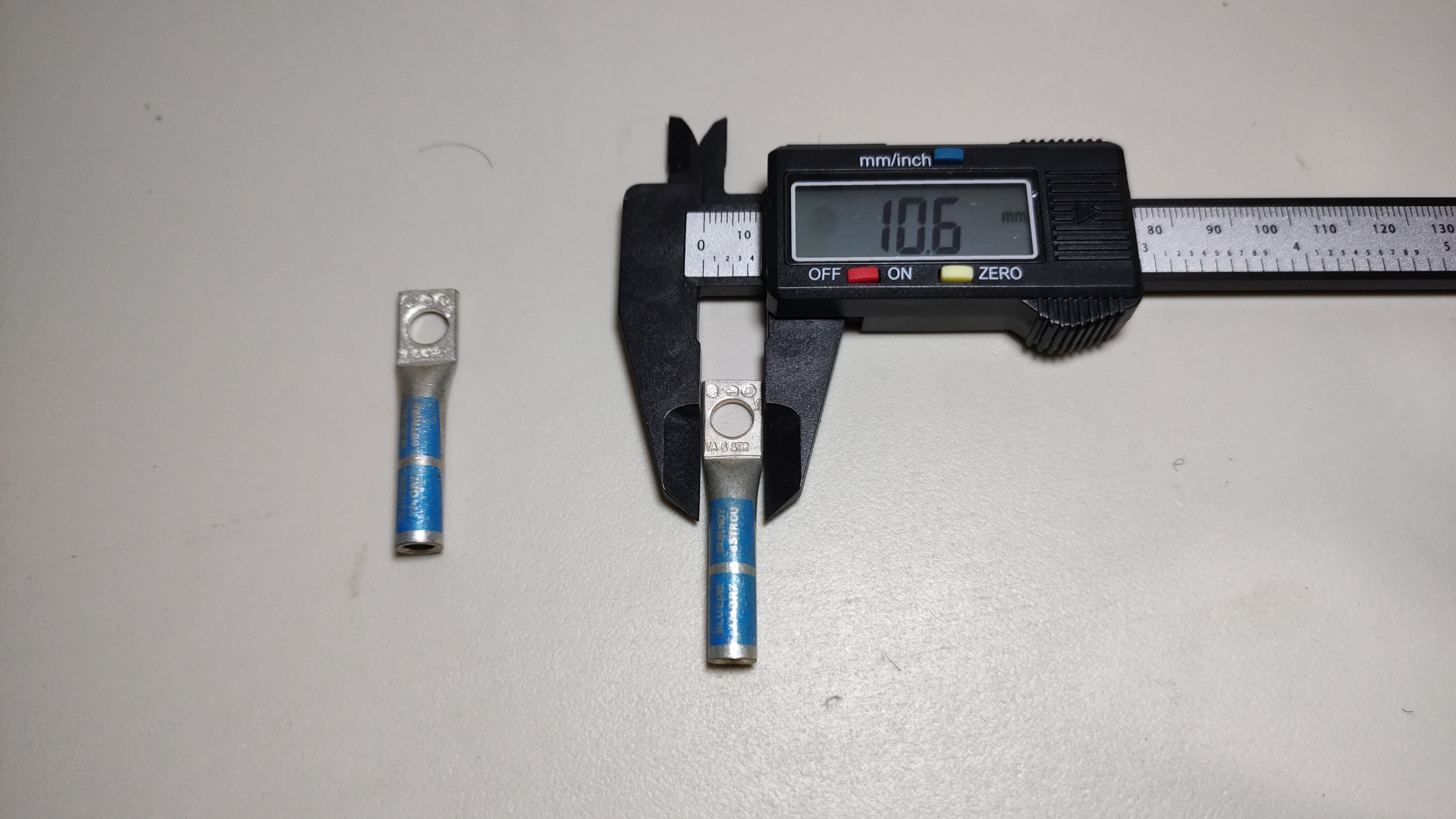 Zapata calibre 6 ojillo 1/4