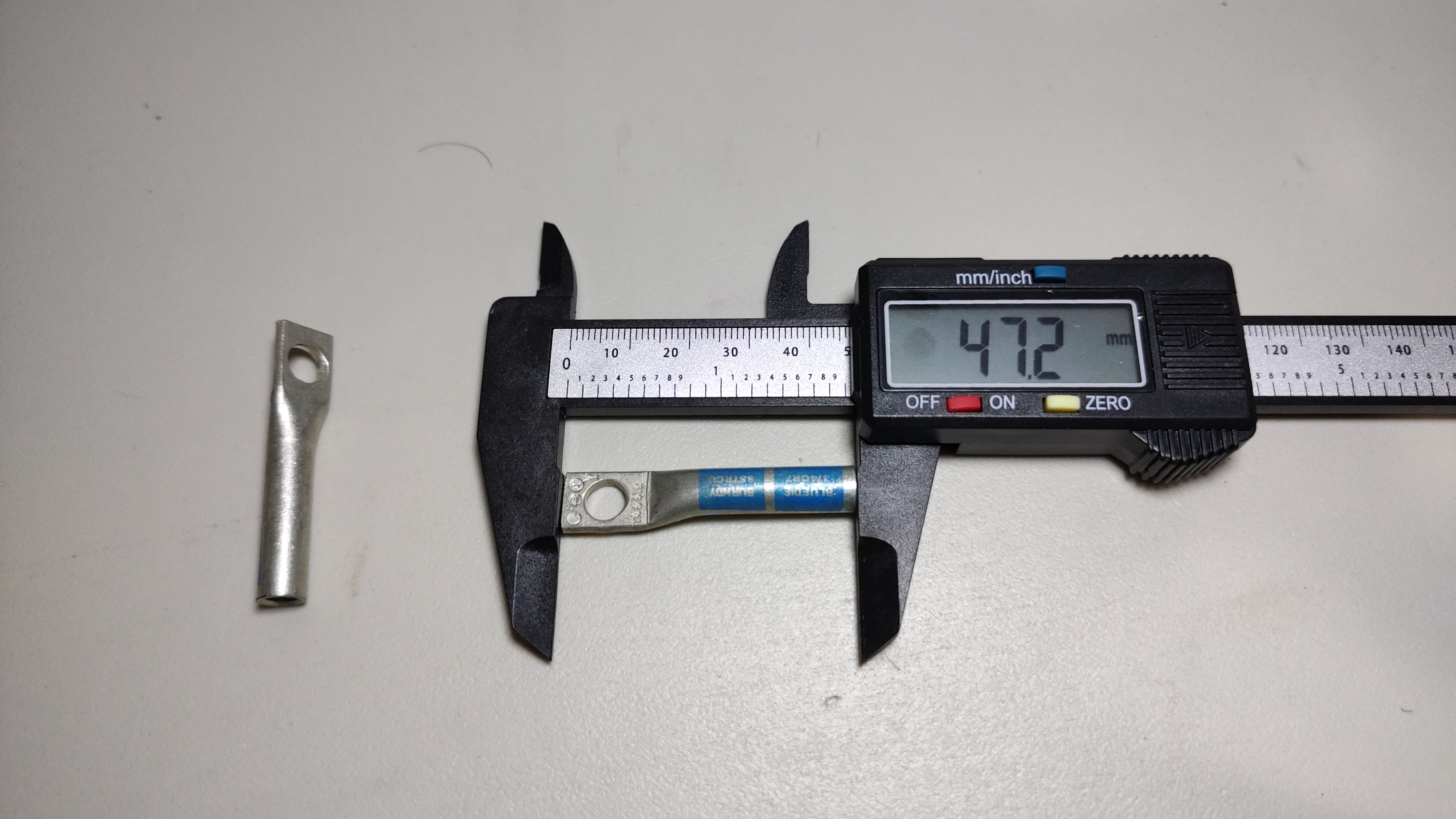 Zapata calibre 6 ojillo 1/4