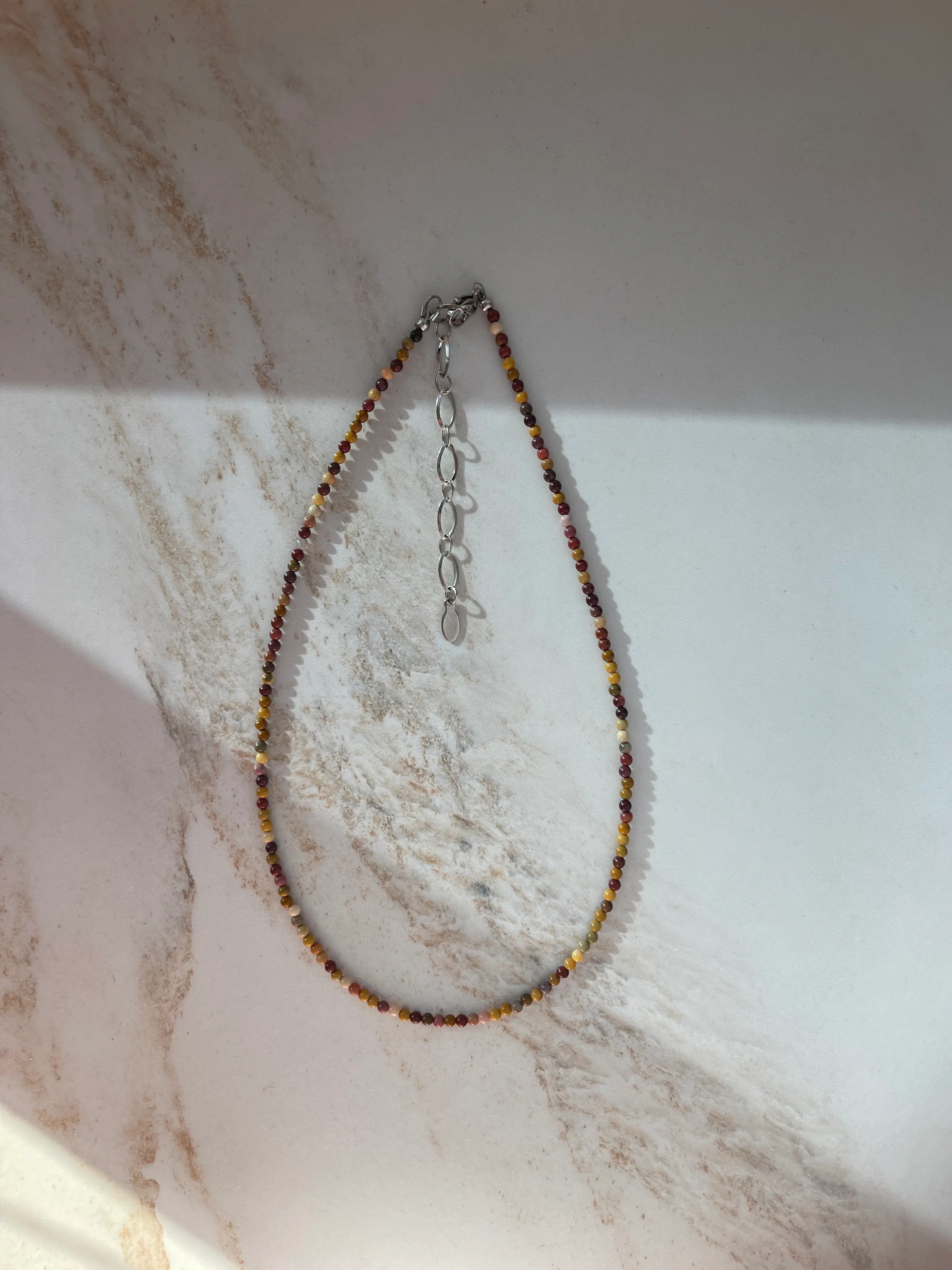 Mokaito vėrinys, 2 mm