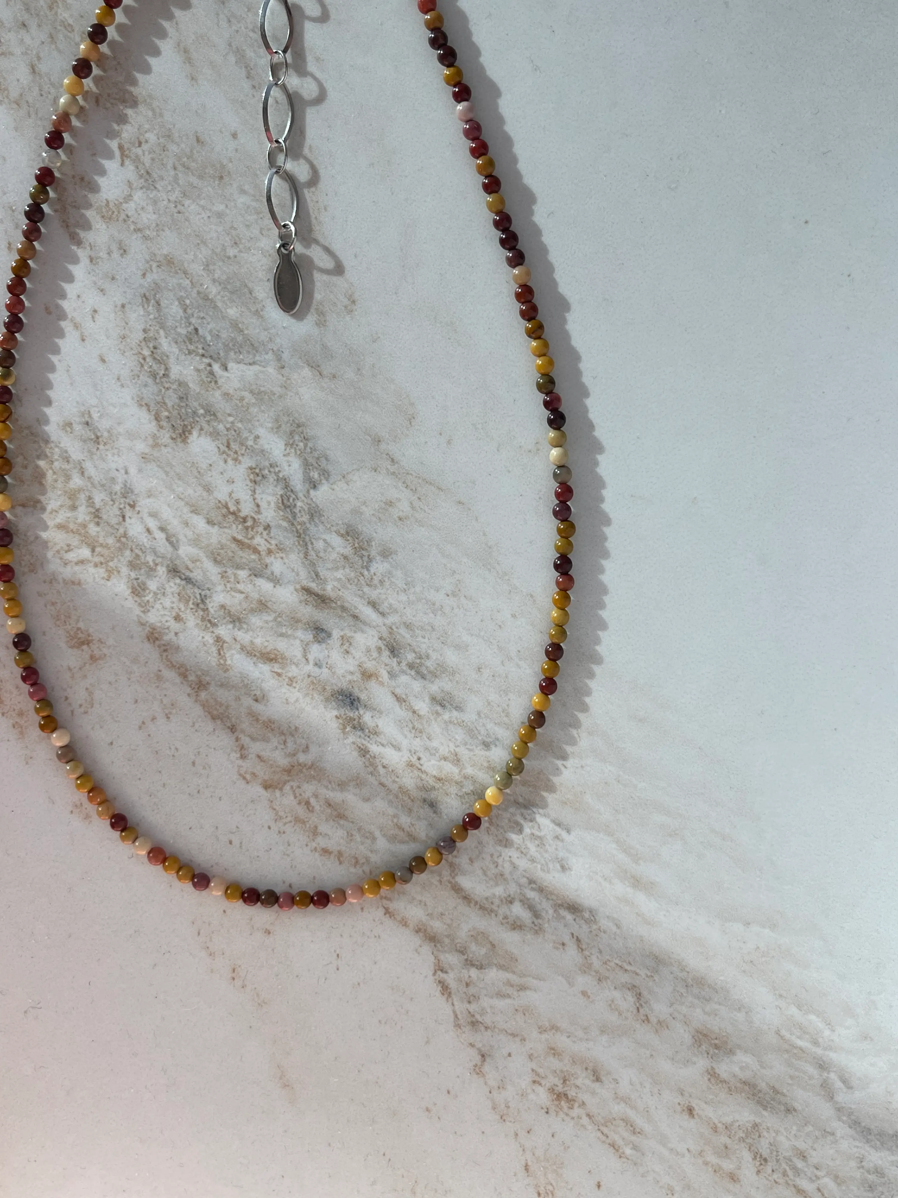 Mokaito vėrinys, 2 mm