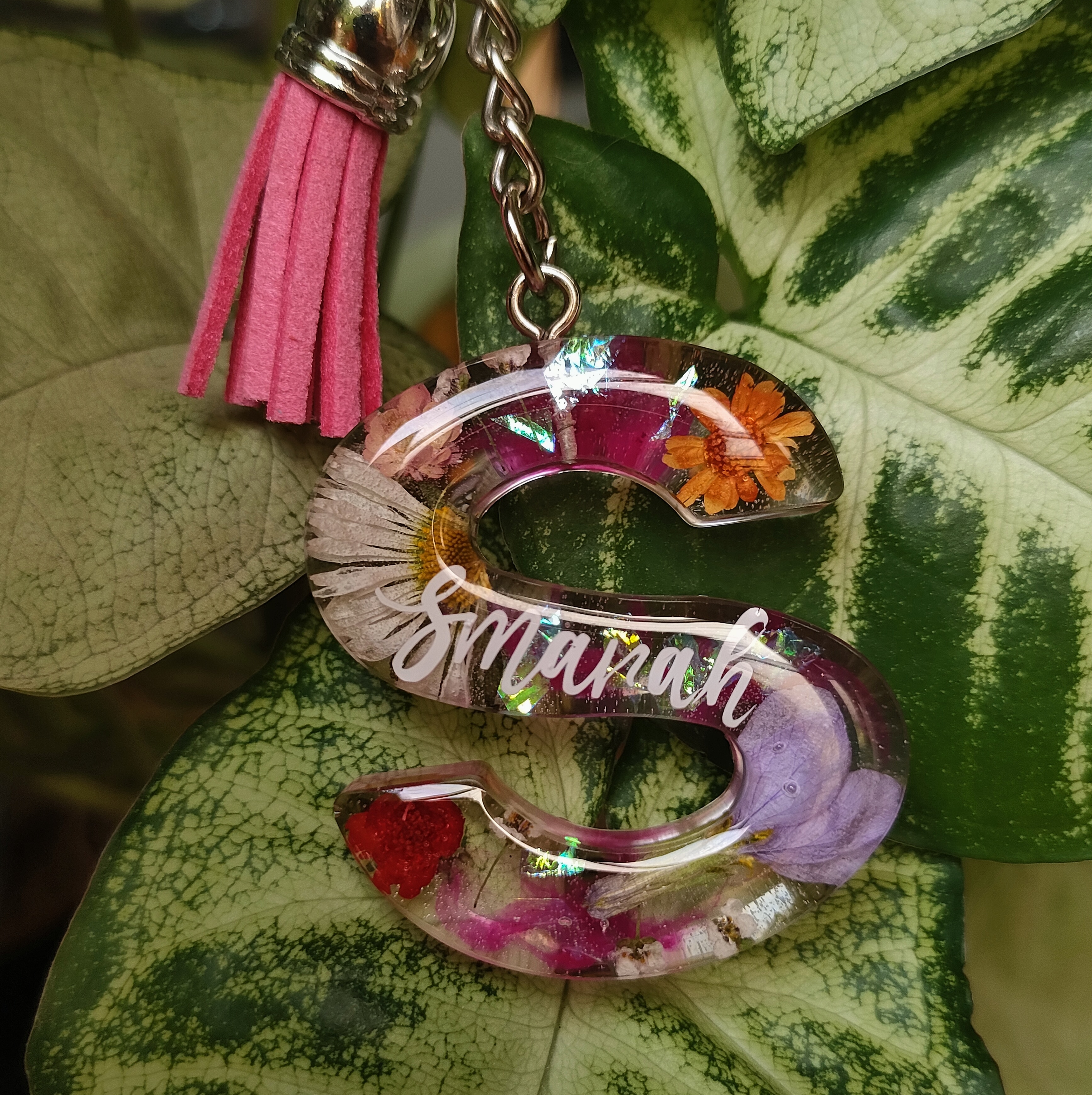 Llavero de inicial personalizado.