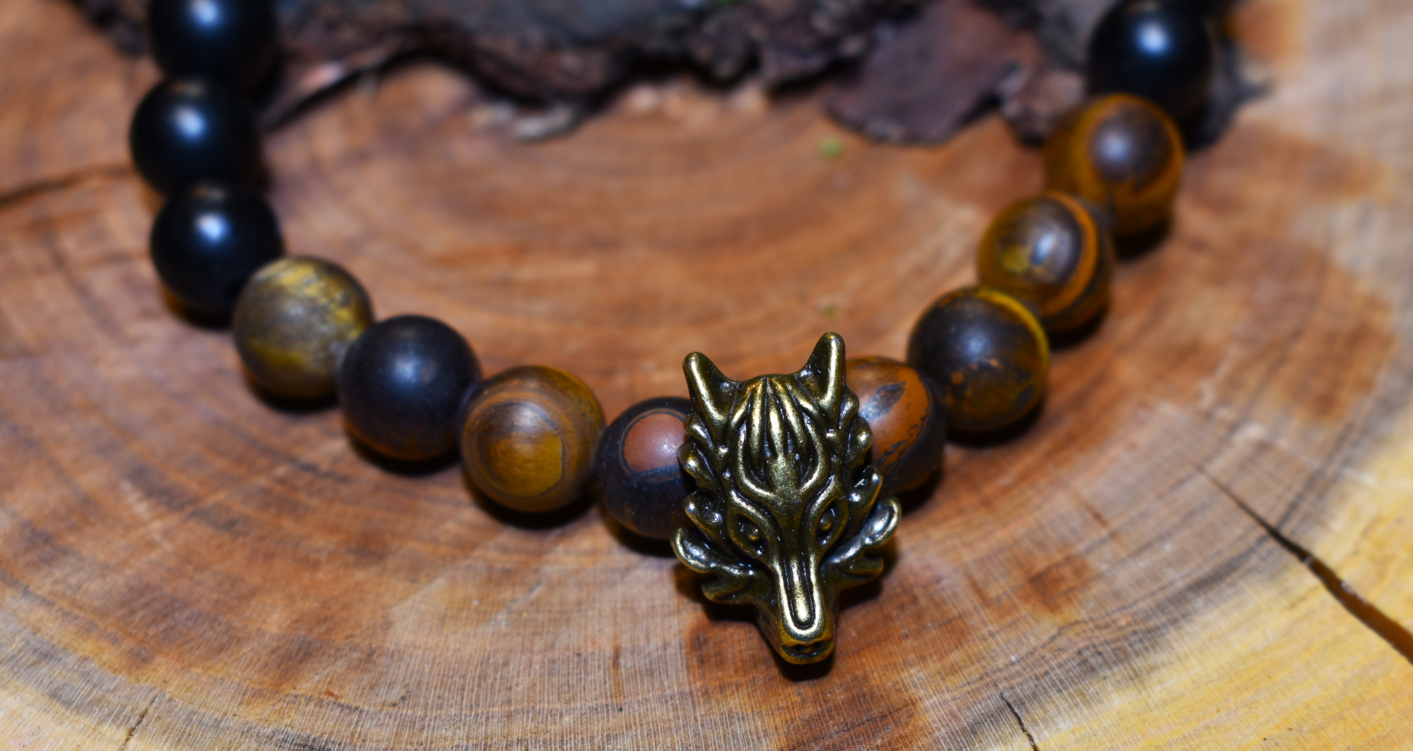 Bracelet Obsidiennes et Oeil de tigre Loup couleur bronze