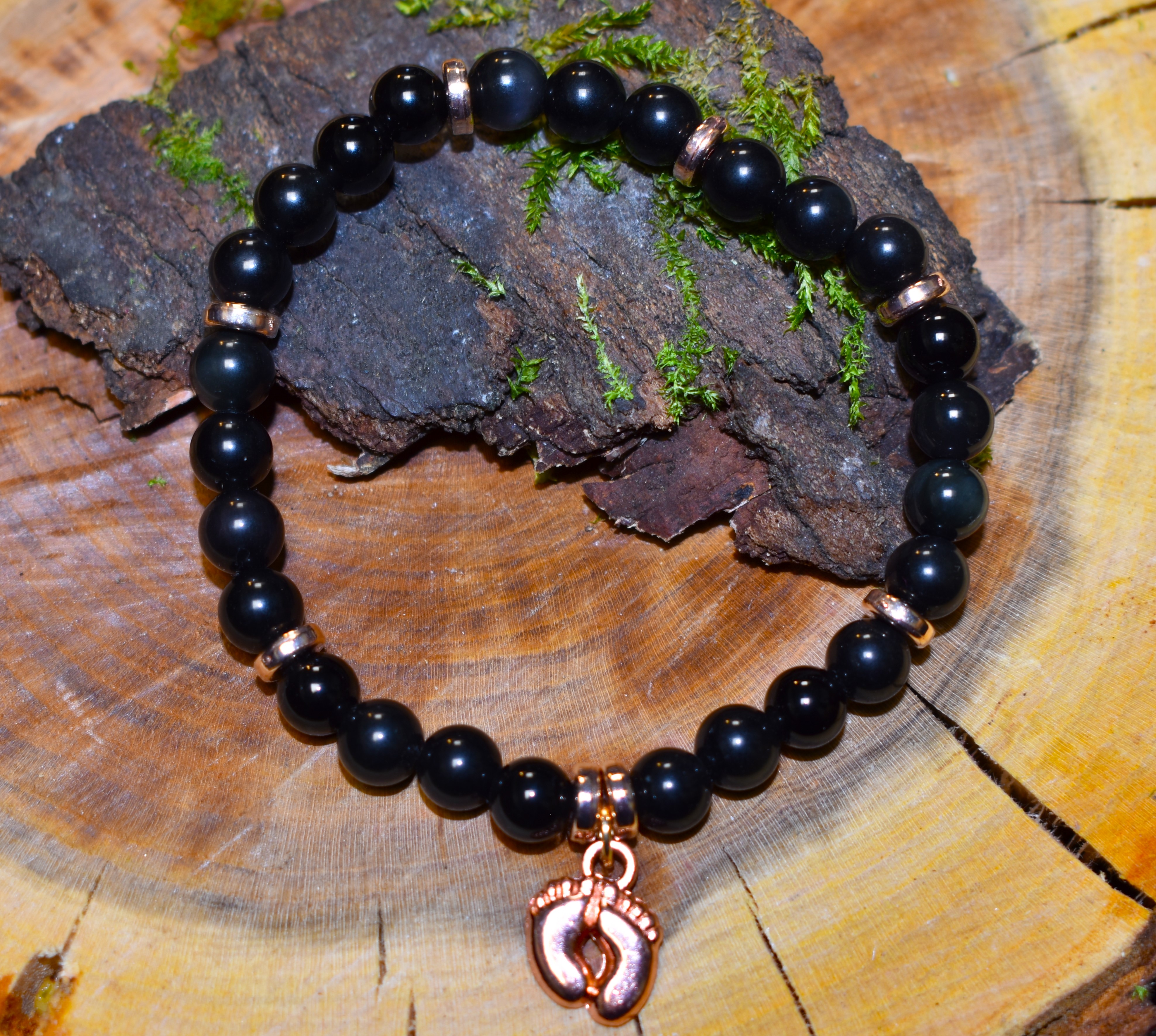 Bracelet Obsidiennes et petits pieds rose dorés
