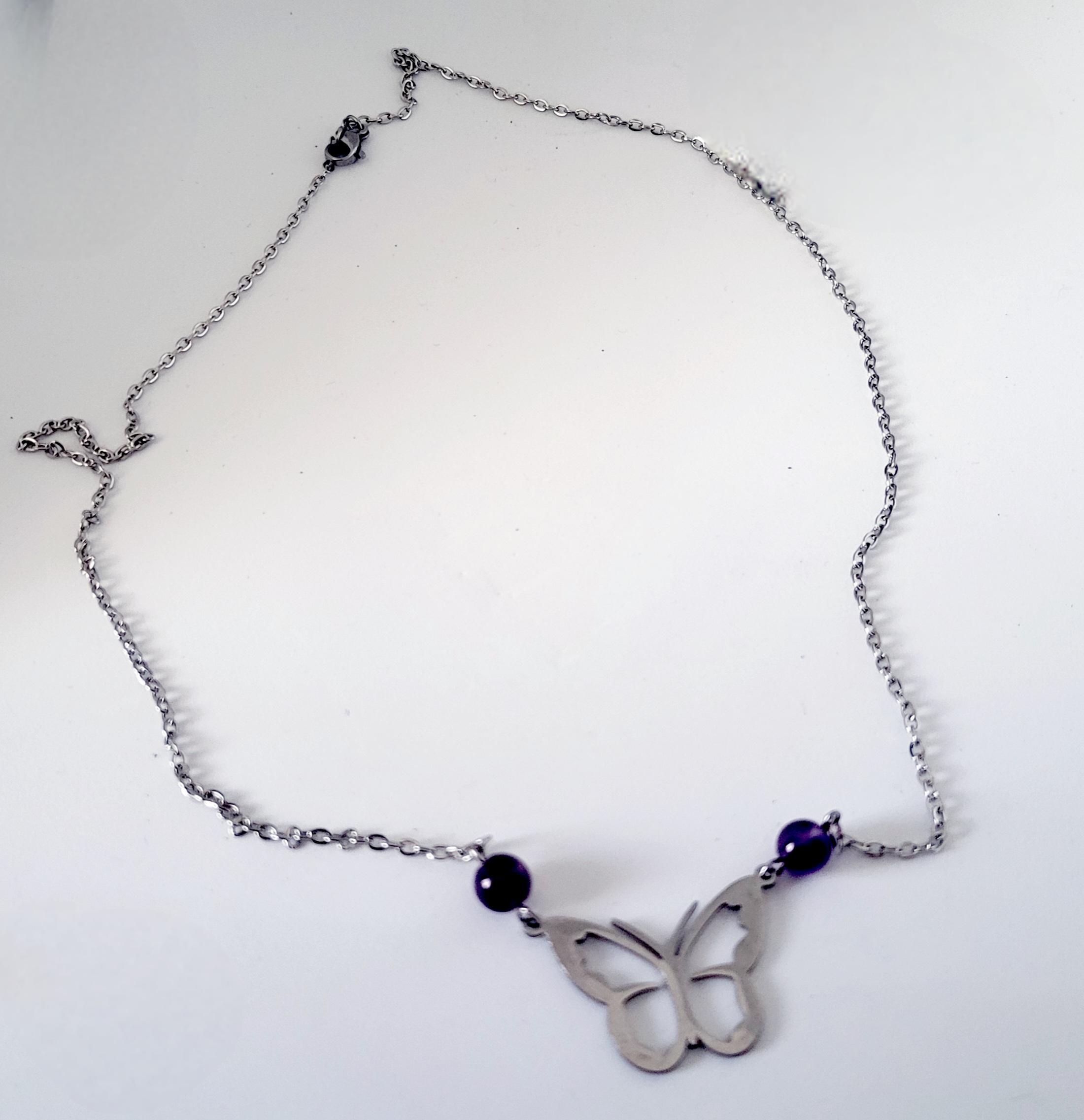 Collier papillon en Améthyste