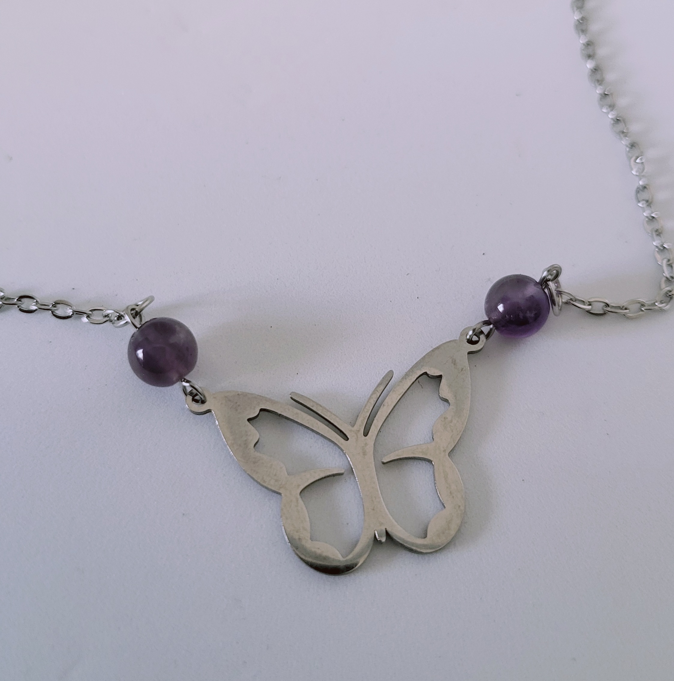 Collier papillon en Améthyste