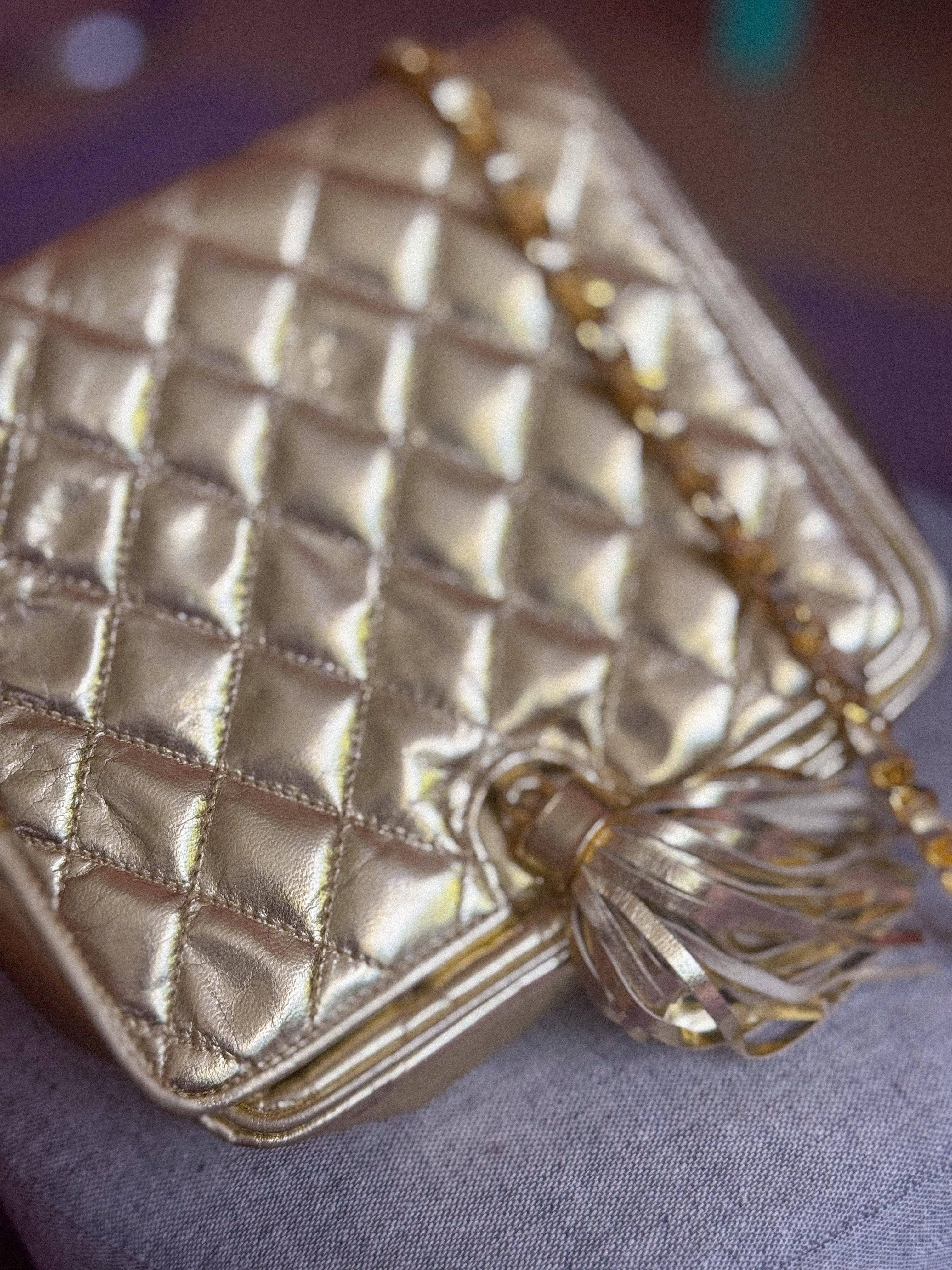 VINTAŽINĖ auksinė odinė rankinė