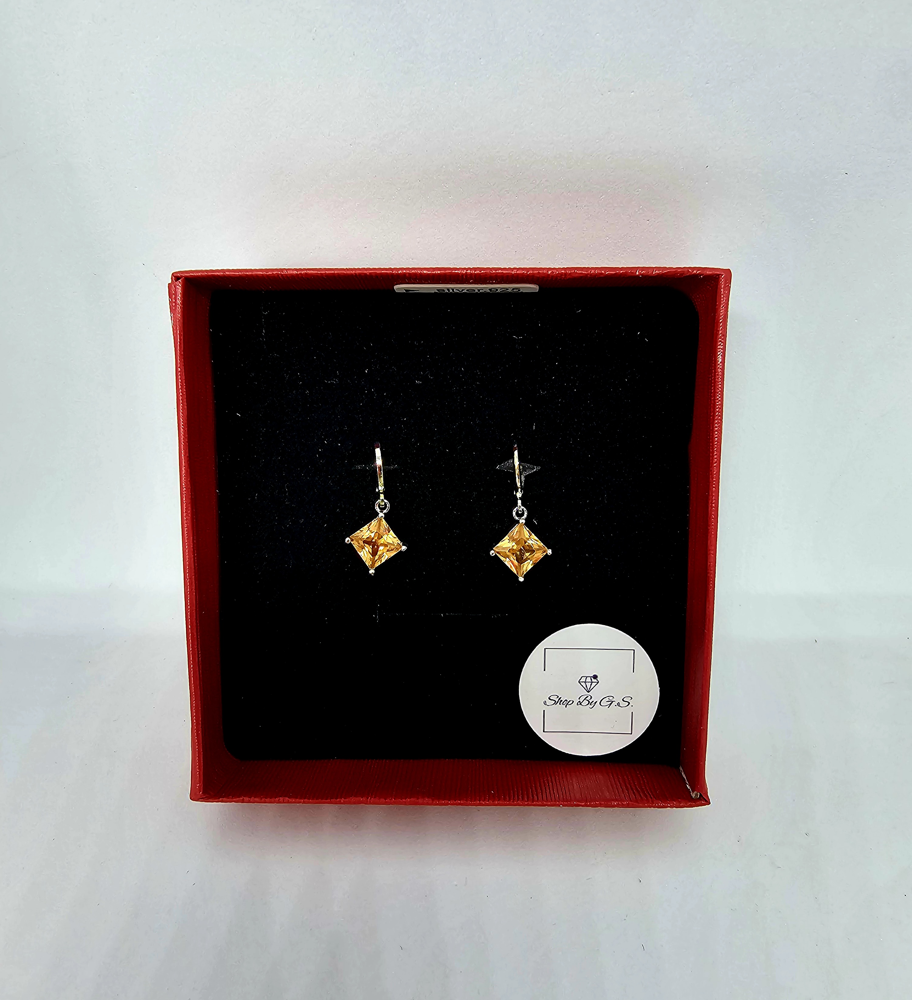 Auskarai su kvadratiniais aukso spalvos cirkoniais