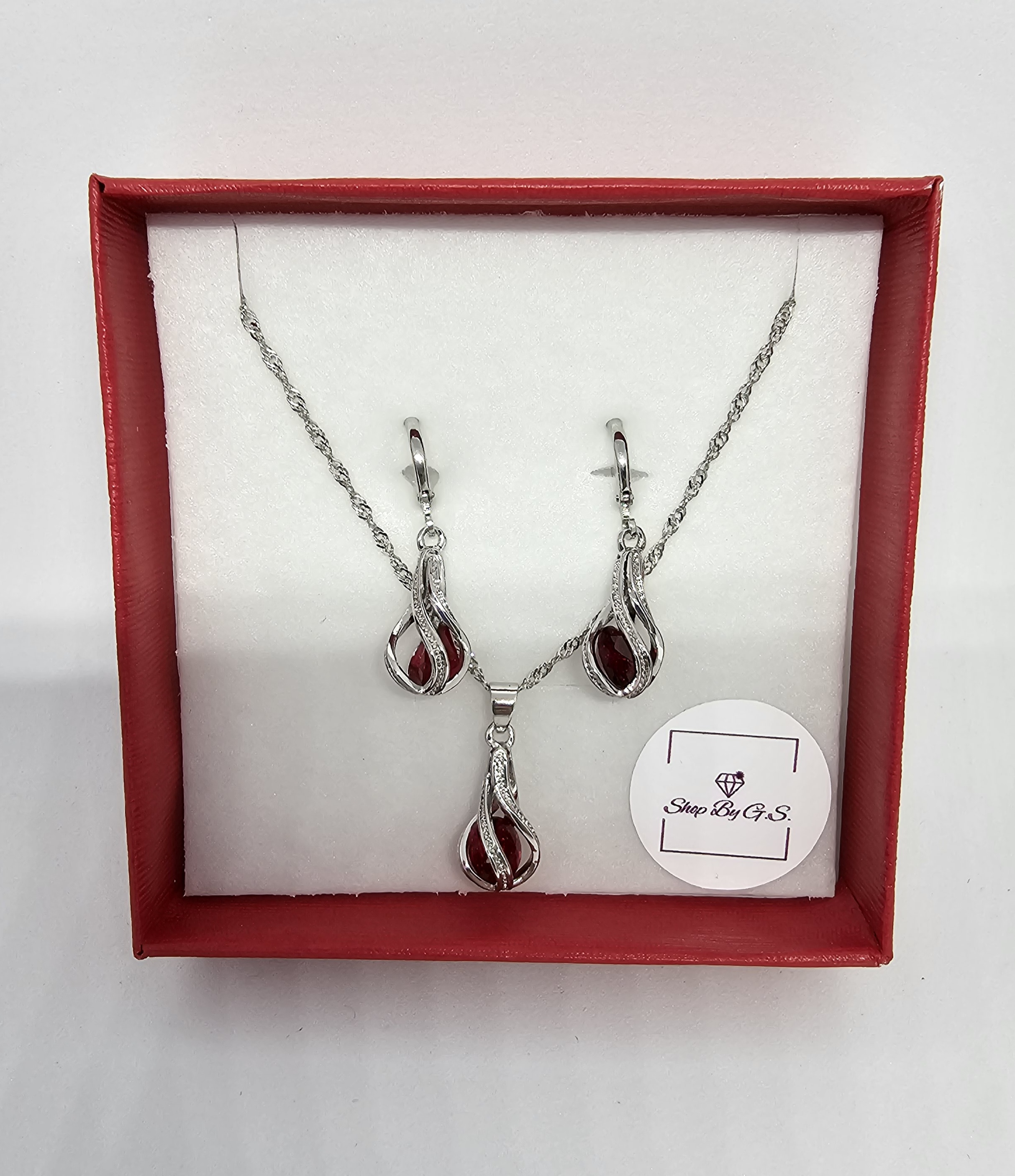 Papuošalų rinkinys suktas lašas su raudonu cirkoniu