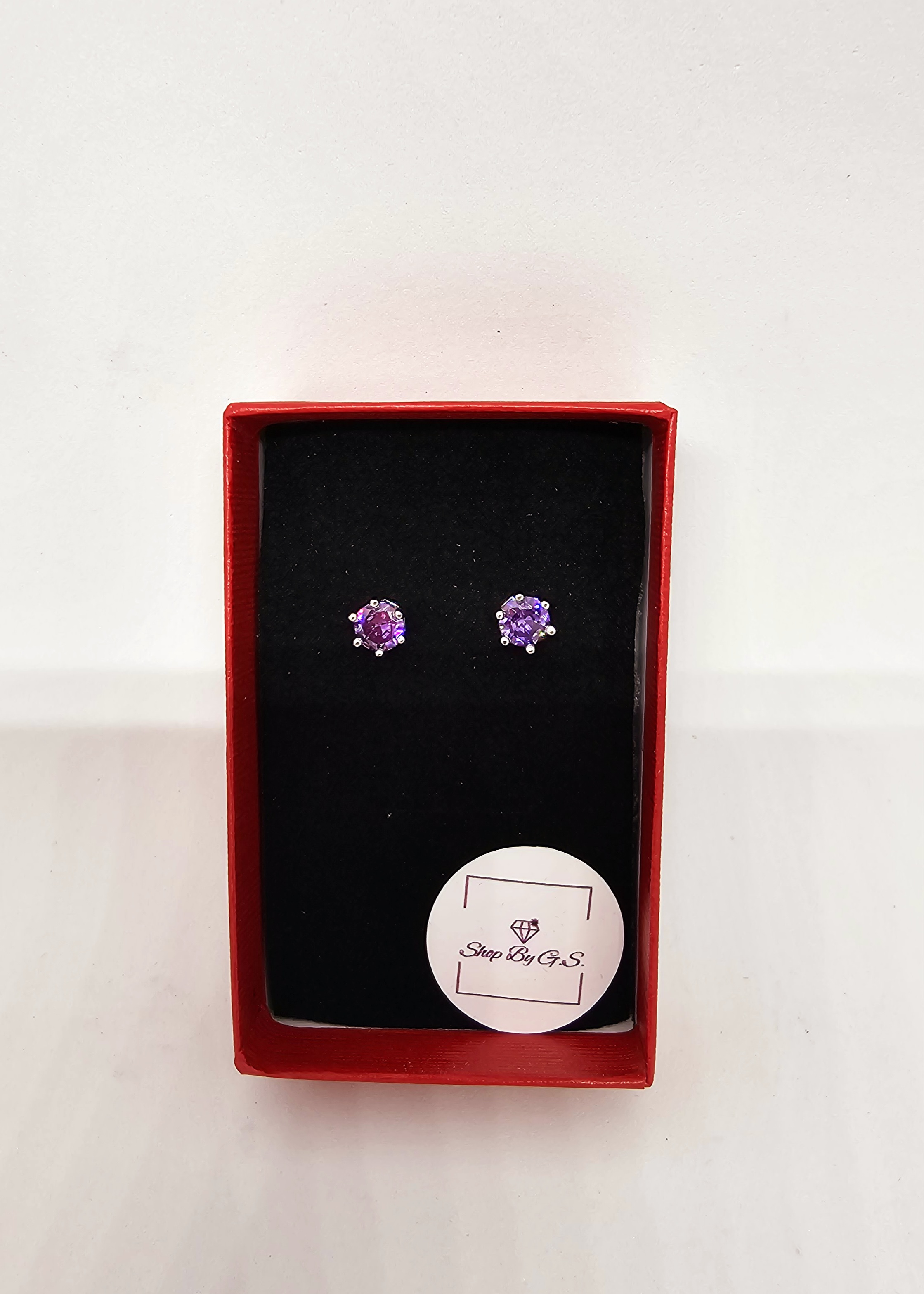 Auskarai su violetiniu cirkoniu