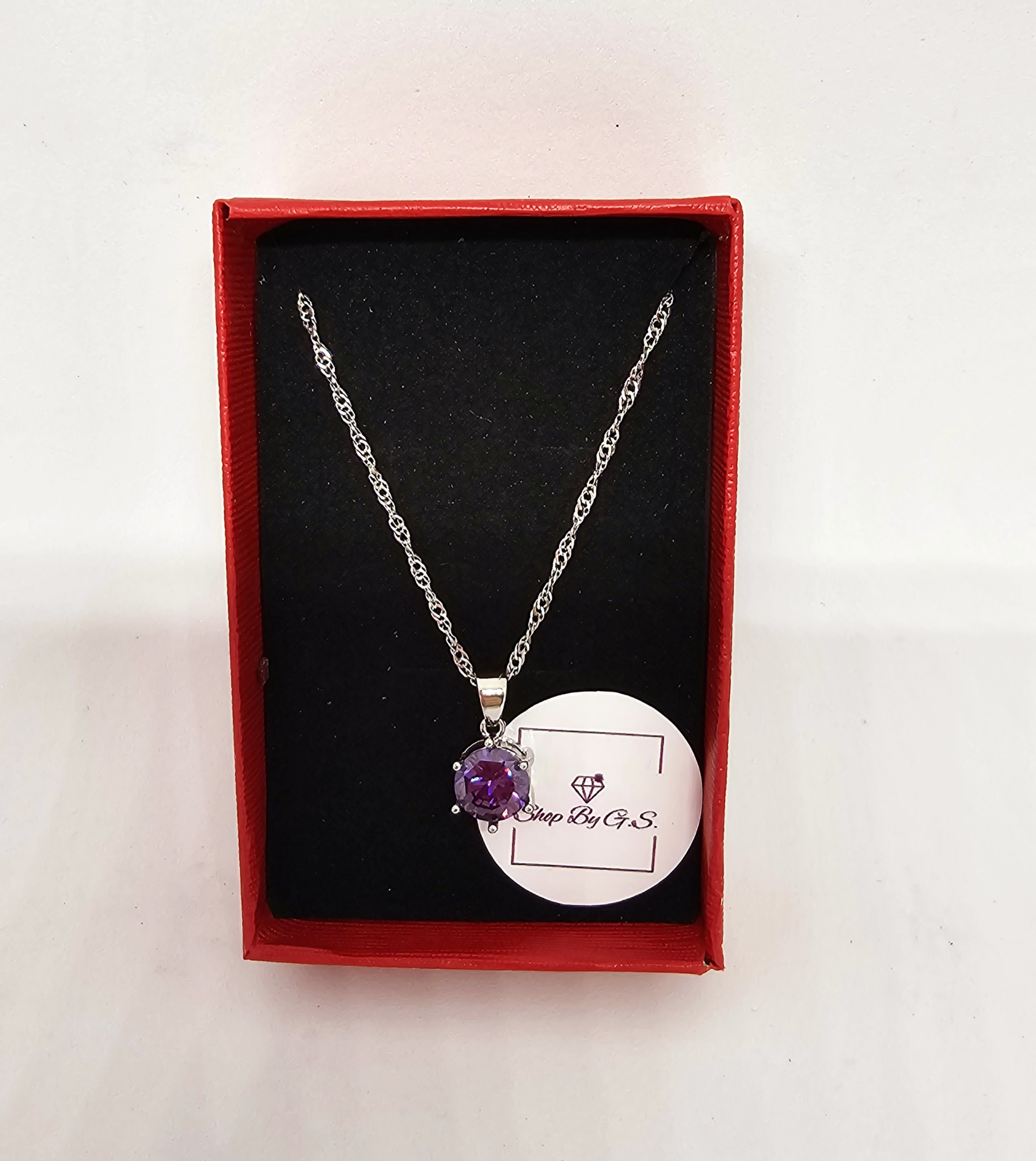 Grandinėlė su violetiniu cirkoniu