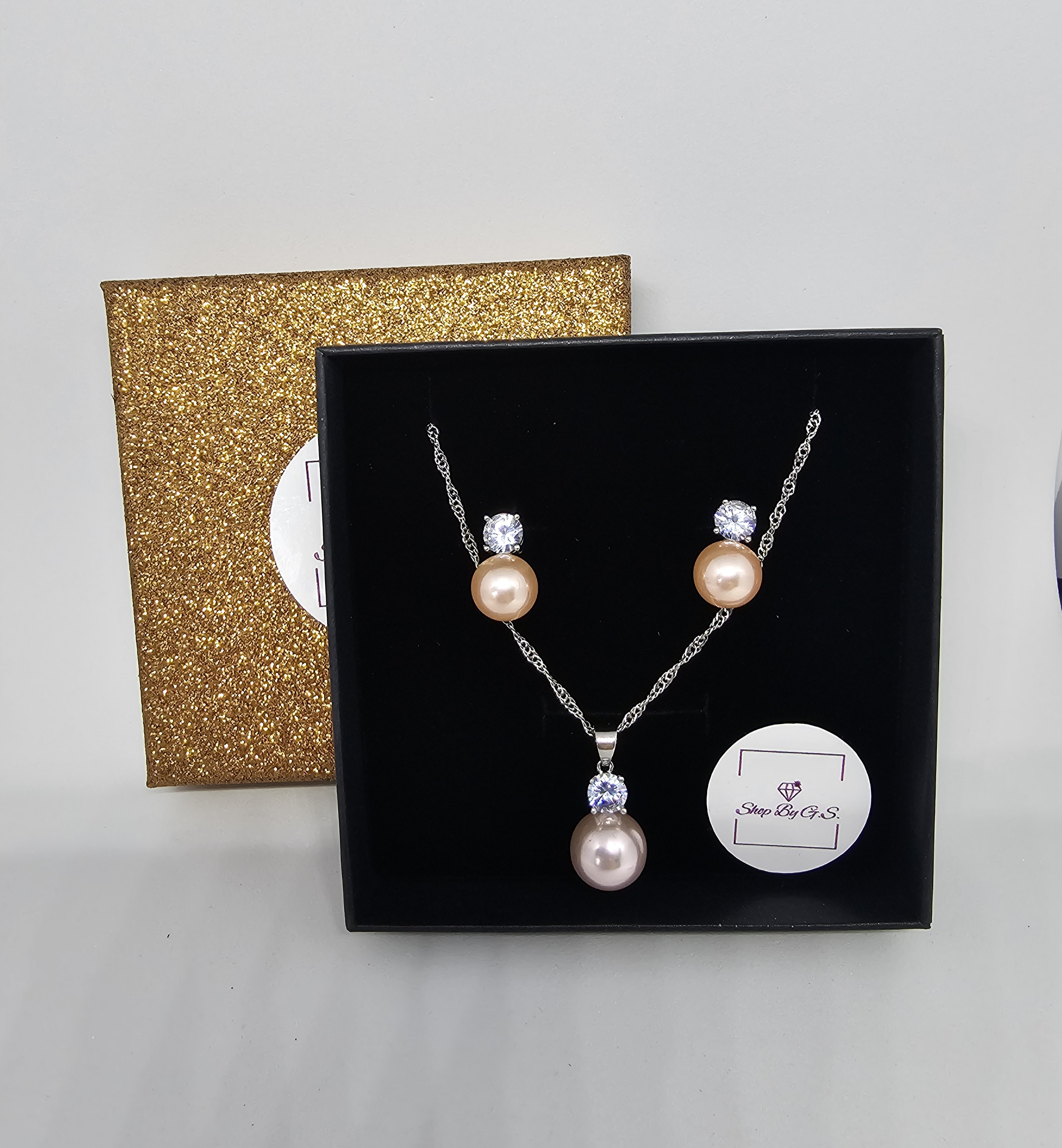 Papuošalų rinkinys su rausvais perliukais ir cirkoniais