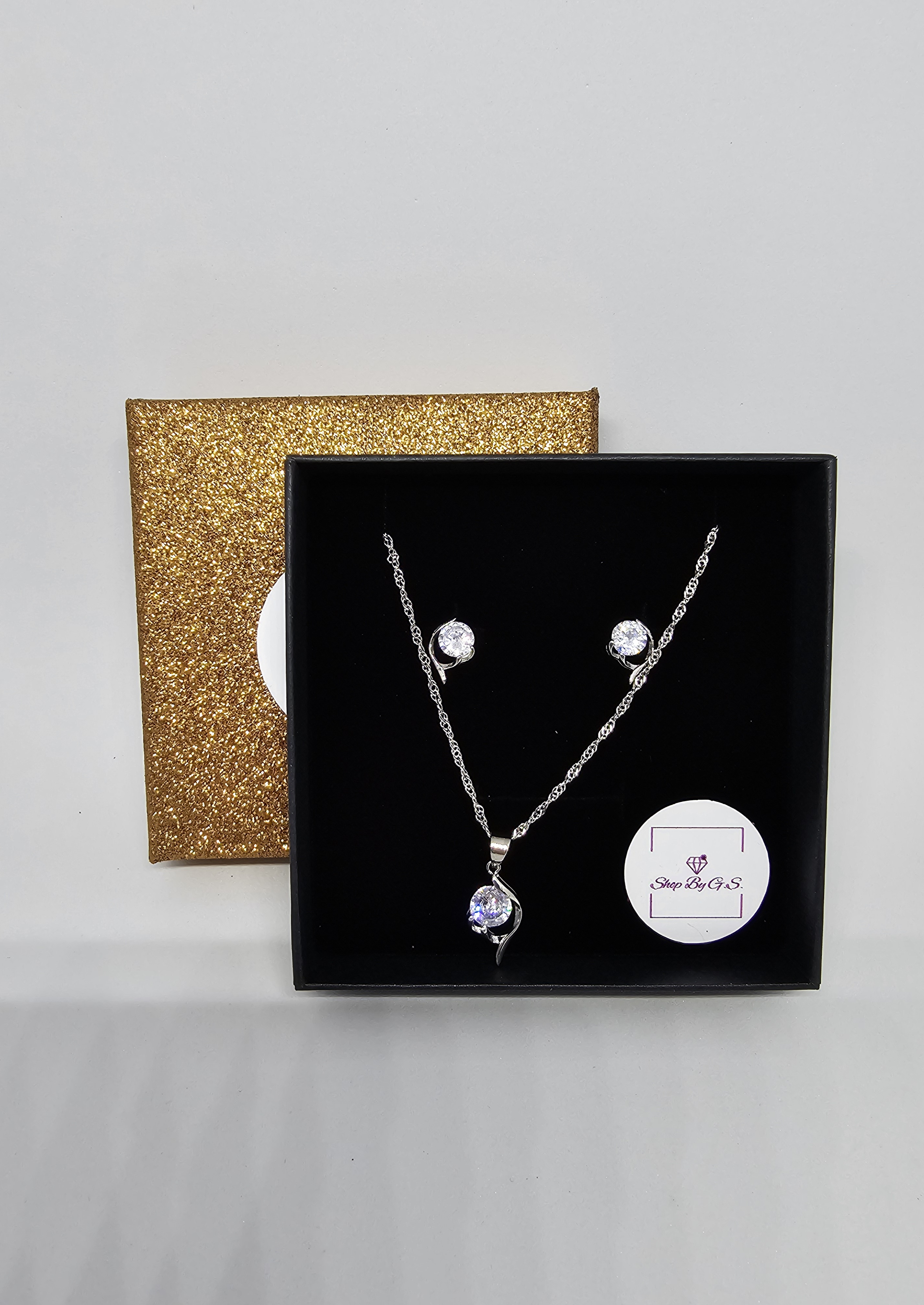 Papuošalų rinkinys su cirkoniais - pusė lapelio