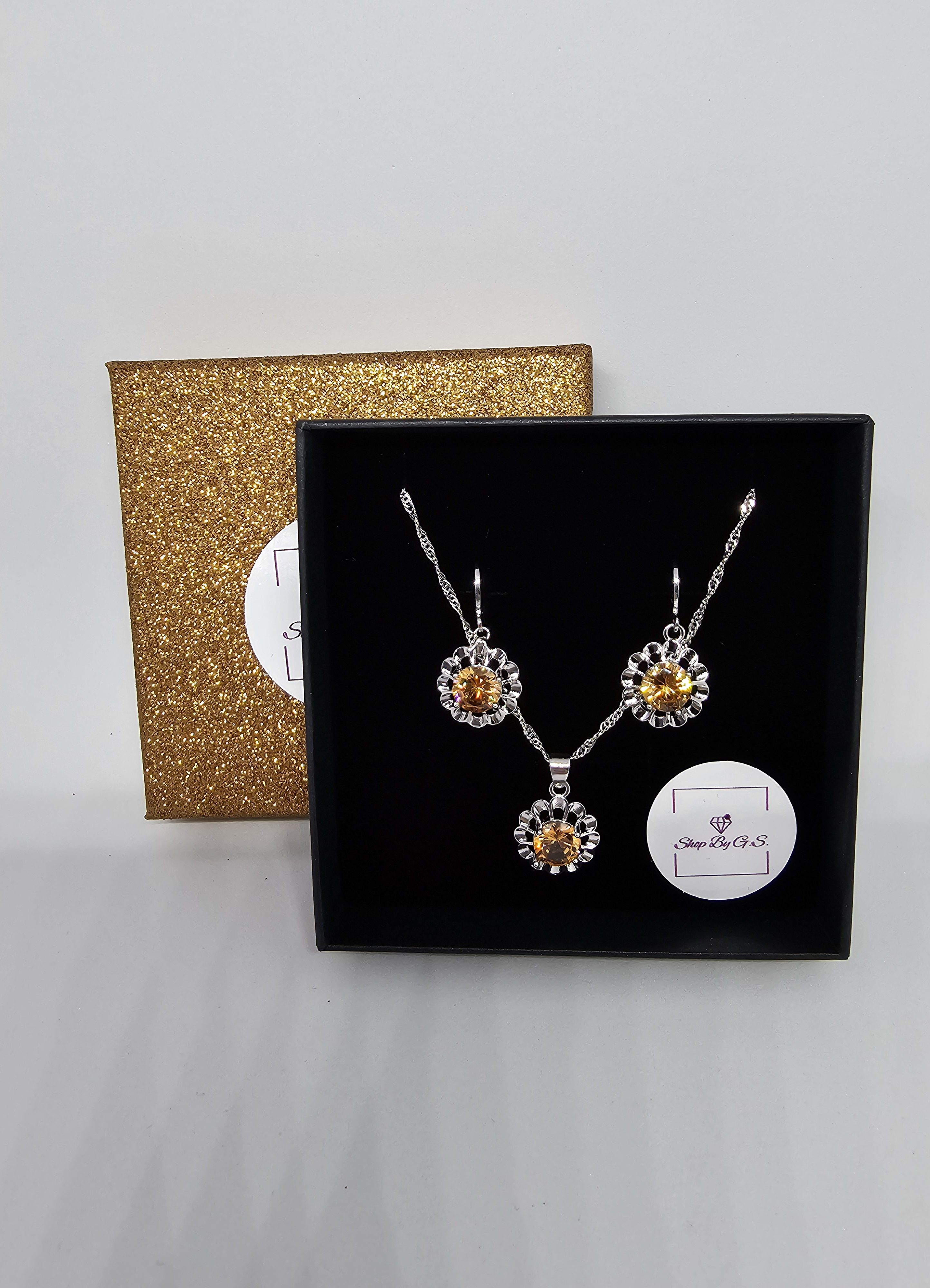 Papuošalų rinkinys su šampaniniu cirkoniu - ramunėlė