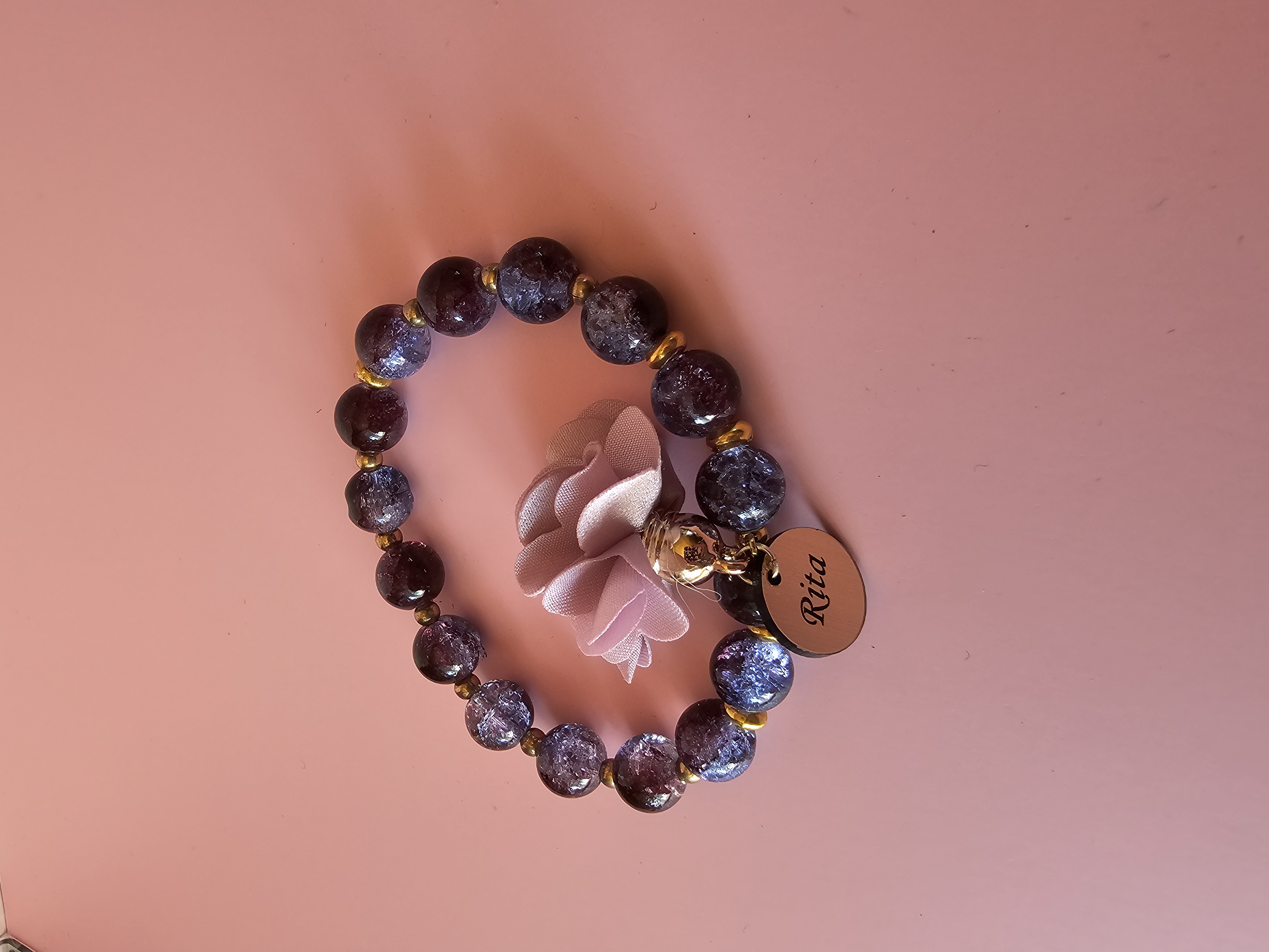 Apyrankė su užrašu "Rita"