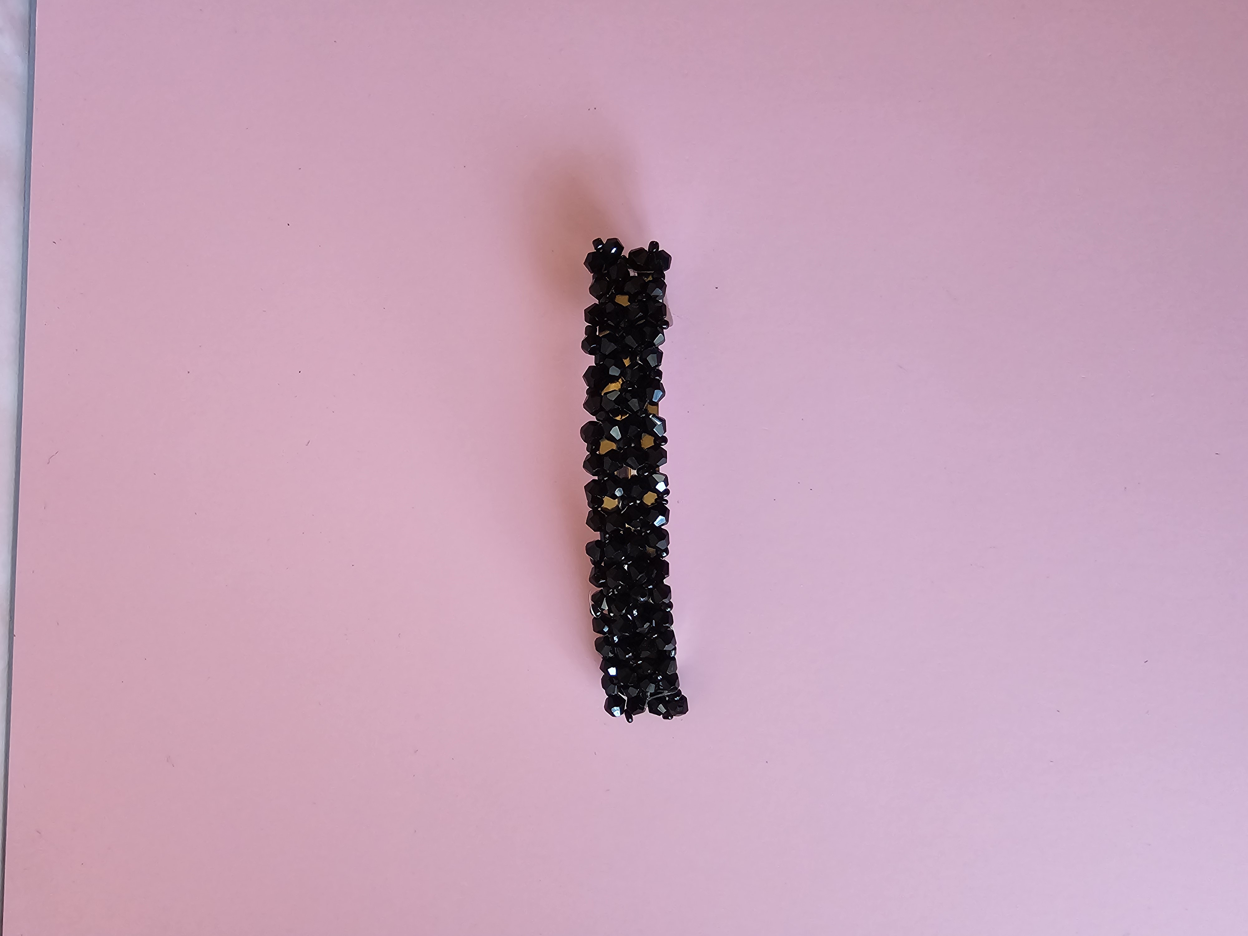 Blizgus juodas plaukų segtukas