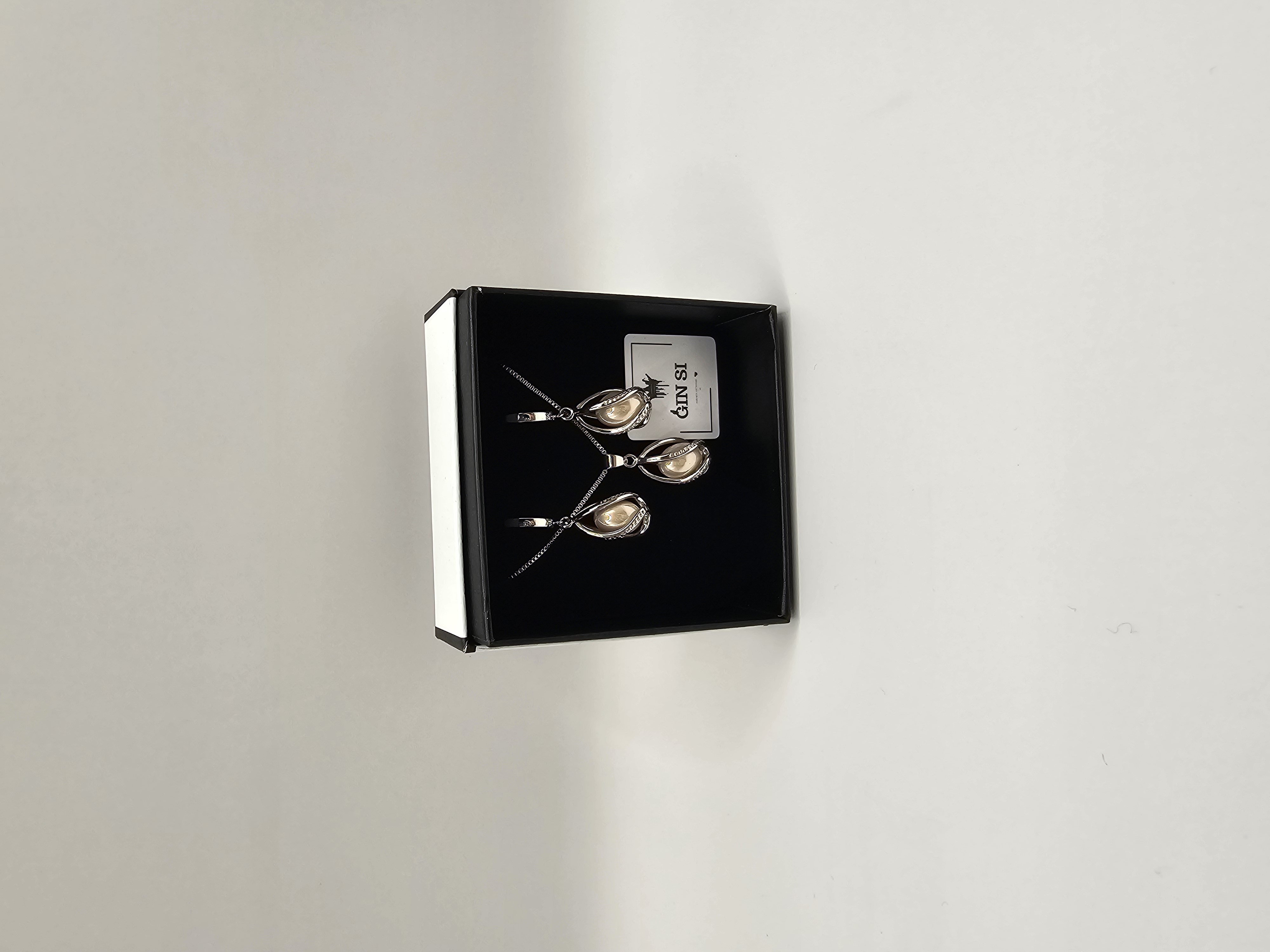 Papuošalų rinkinys suktas lašas su rausvu perlu