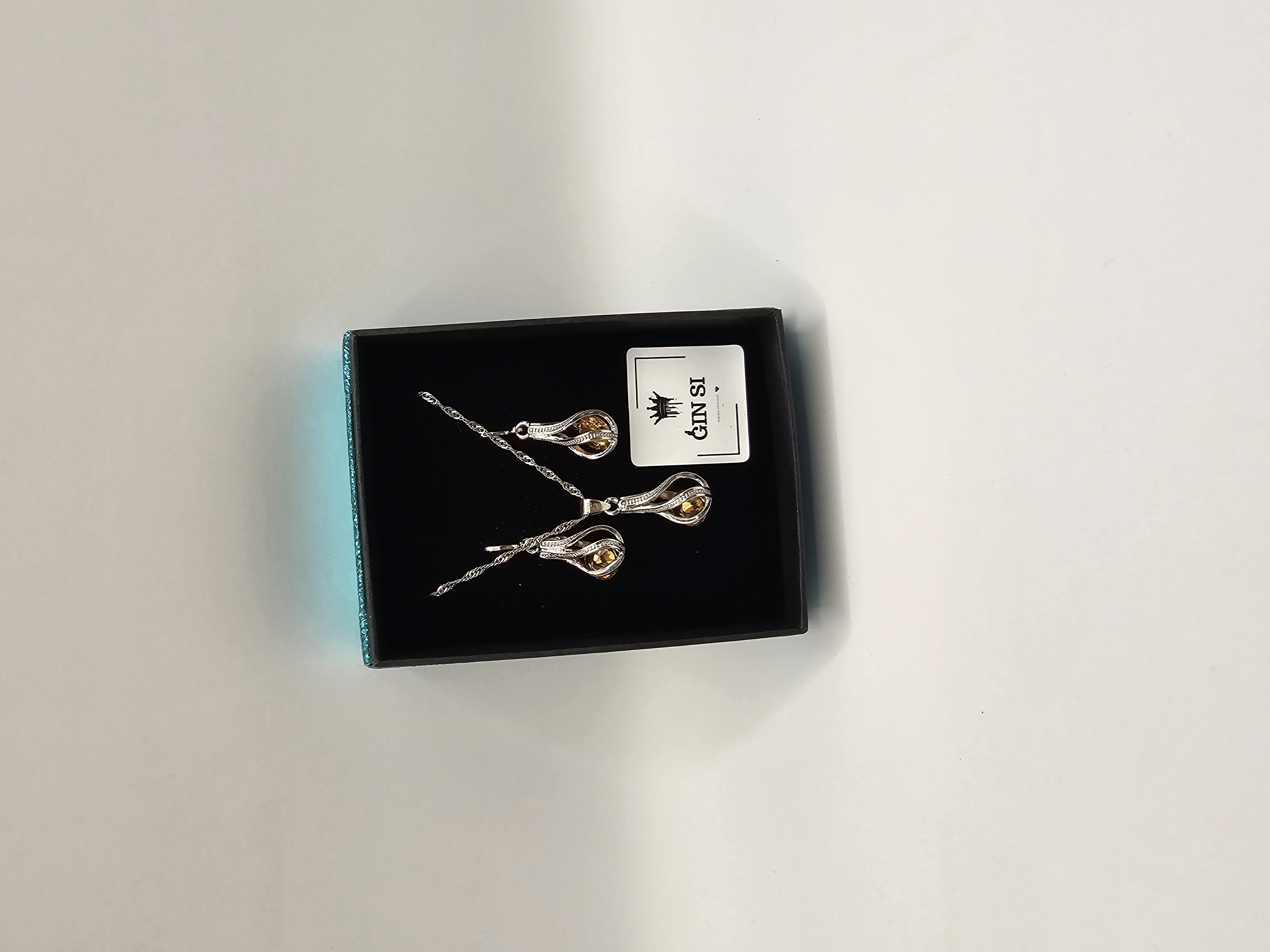 Papuošalų rinkinys suktas lašas su šampaniniu cirkoniu