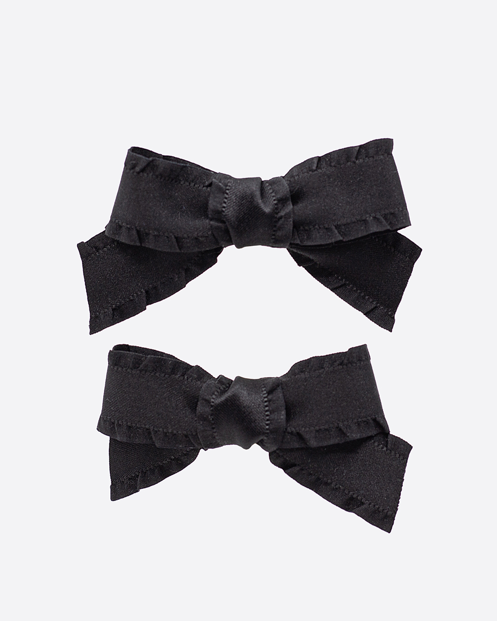 Segtukai rauktais krašteliais, Juodi