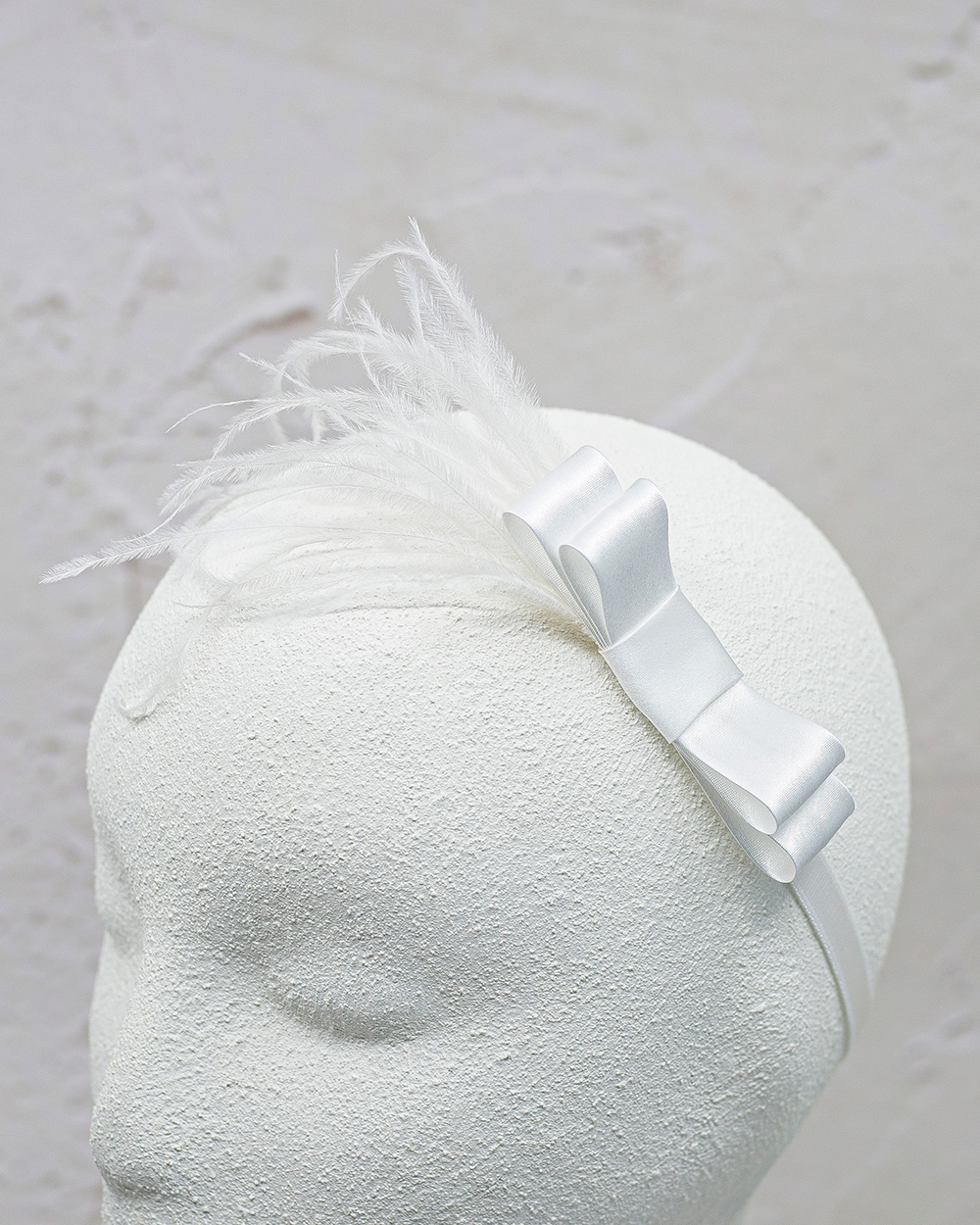 Krikšto žvakės ir galvajuostės rinkinys su plunksnomis