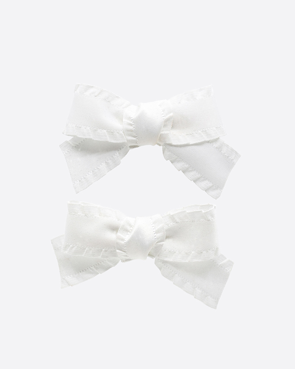 Segtukai rauktais krašteliais, Balti