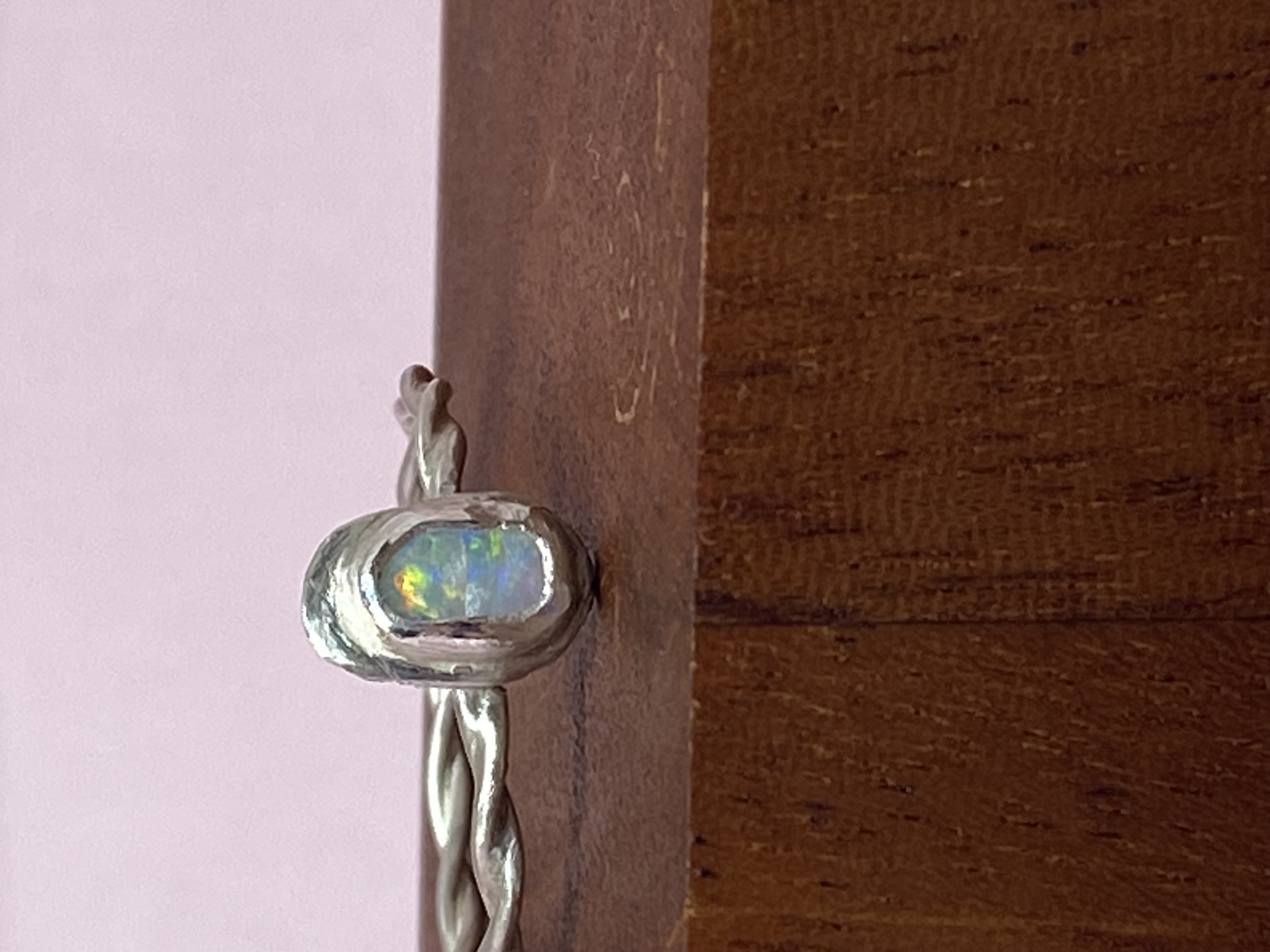 Australian Opal with Pink Fire 7x5mm Set in Sterling Silver with double Wire Twist Ring Band Size 9.5