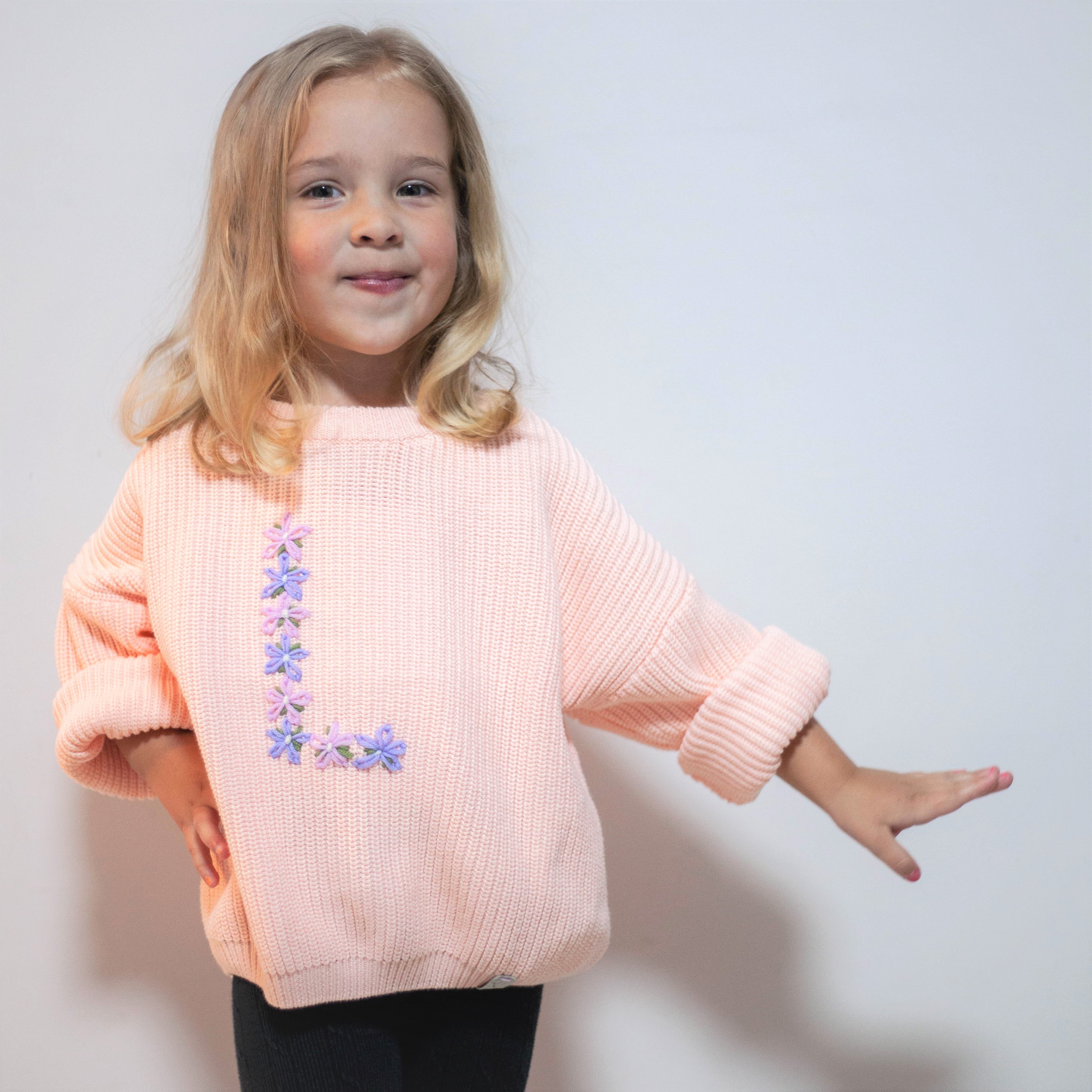 Siuvinėtas megztinis