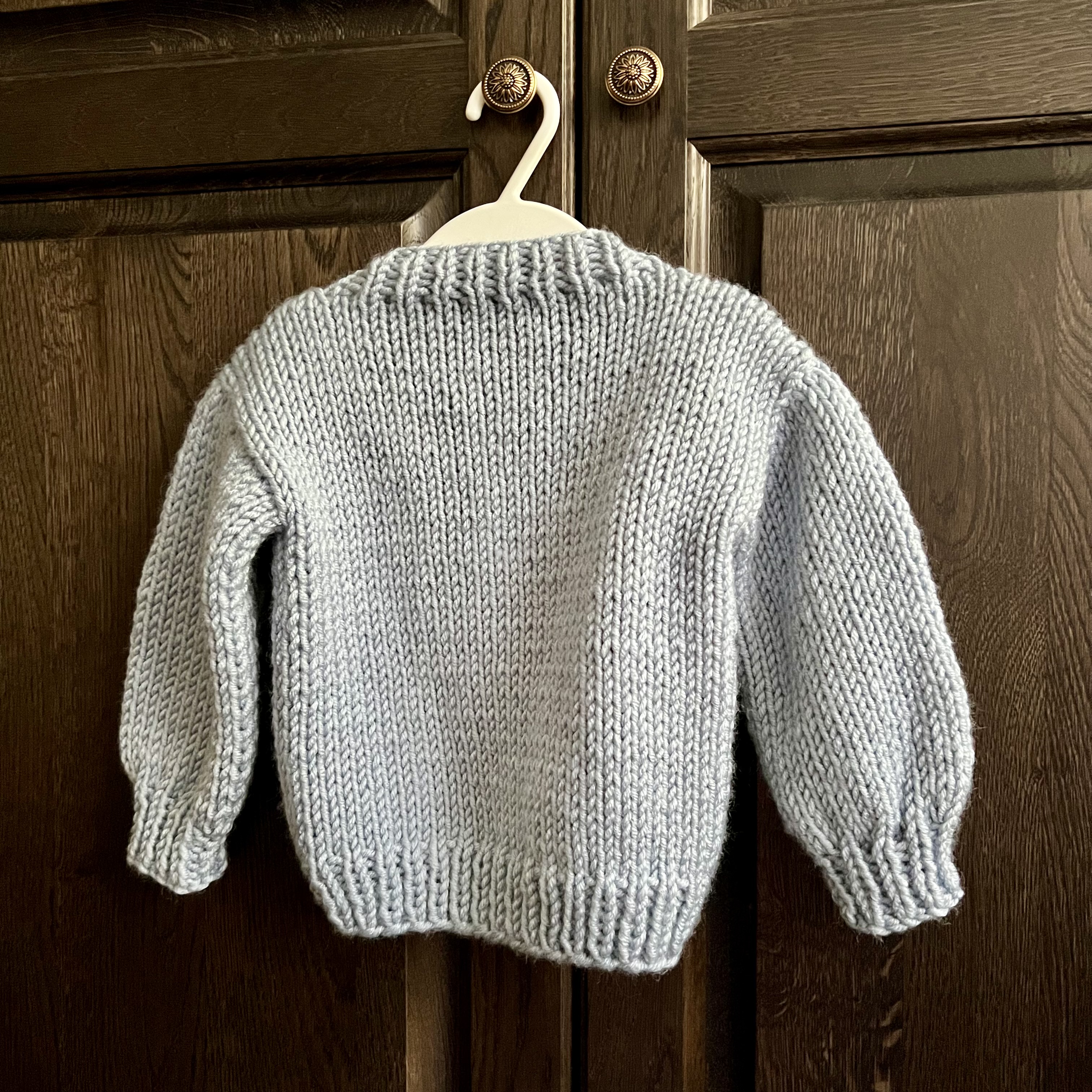 Megztinis su debesėliais kūdikiui