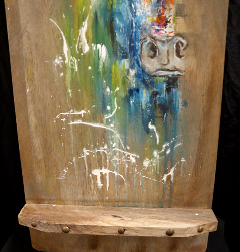 Planche décorative en bois avec peinture de taureau