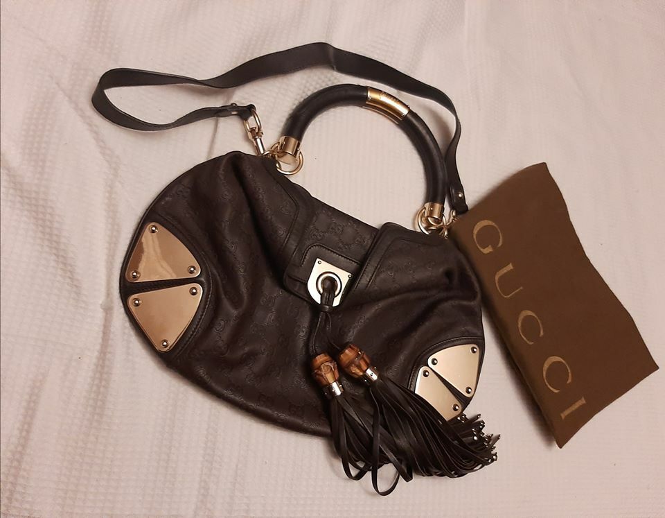 Authentic Gucci Dark Brown Guccissima Leather Indy Bag retail price $2,590