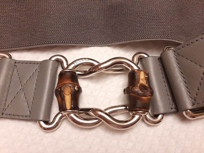 Authentic gucci women stretch grey belt size 32"